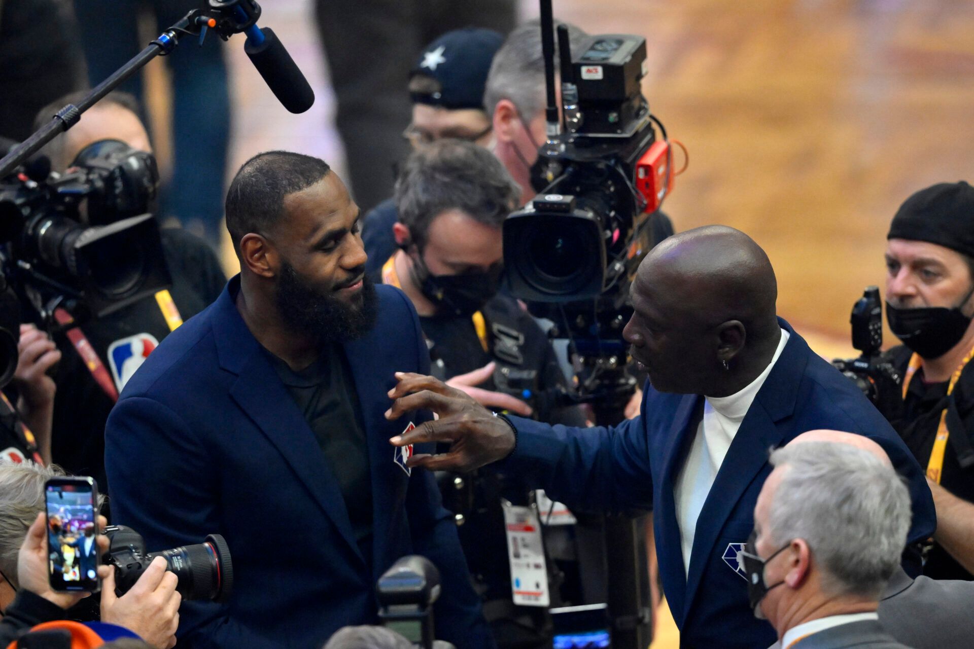 Lebron James and Michael Jordan on court during halftime during the 2022 NBA All-Star Game at Rocket Mortgage FieldHouse.
