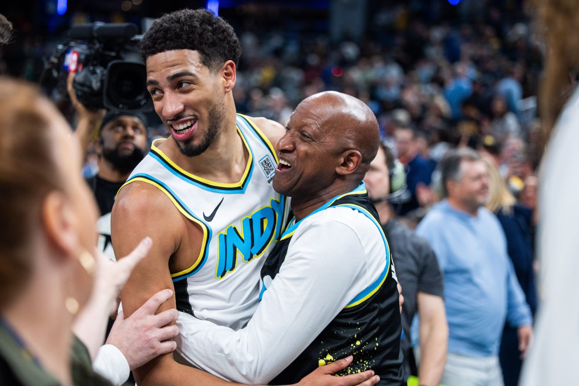 Indiana Pacers guard Tyrese Haliburton (0) and  his dad celebrate the win over Milwaukee Bucks at Gainbridge Fieldhouse.