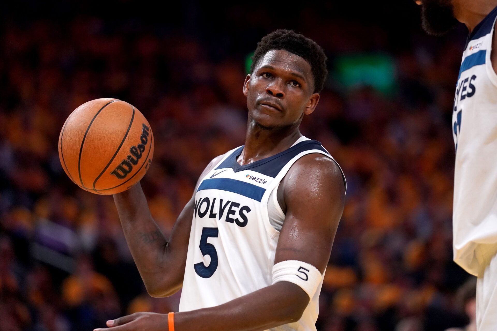 Minnesota Timberwolves guard Anthony Edwards (5) holds onto the ball after being called for a foul against the Golden State Warriors in the third quarter during game four of the second round for the 2025 NBA Playoffs at Chase Center.