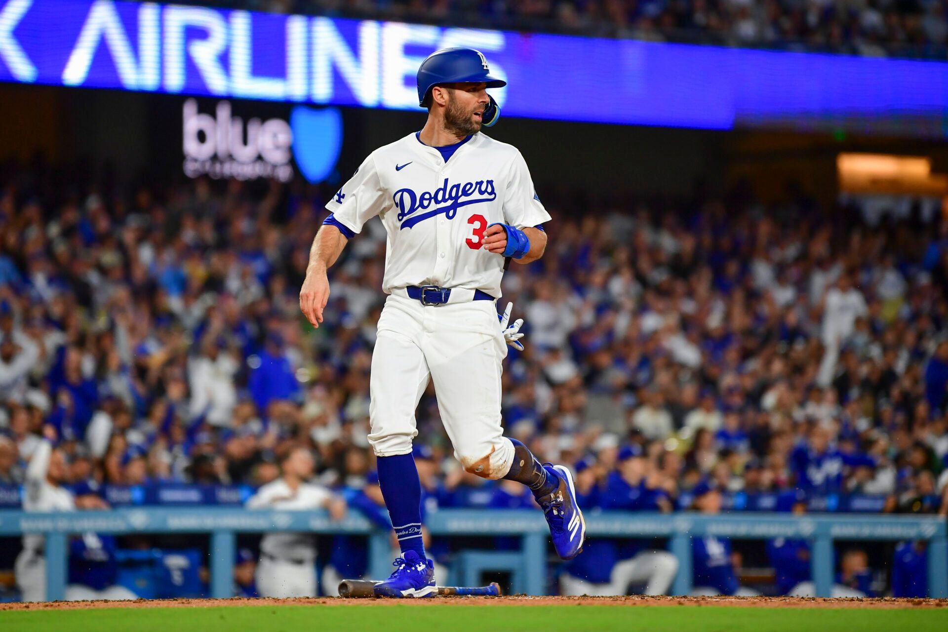 Los Angeles Dodgers outfielder Chris Taylor (3) scores a run in the third inning against the Oakland Athletics at Dodger Stadium.