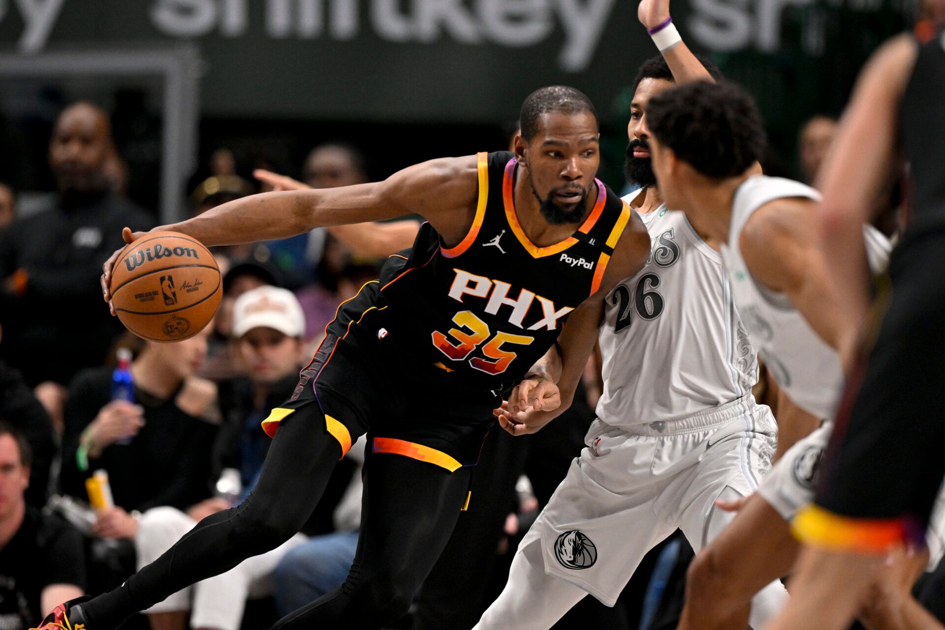 Phoenix Suns forward Kevin Durant (35) moves to the basket against Dallas Mavericks guard Spencer Dinwiddie (26) during the second half at the American Airlines Center.
