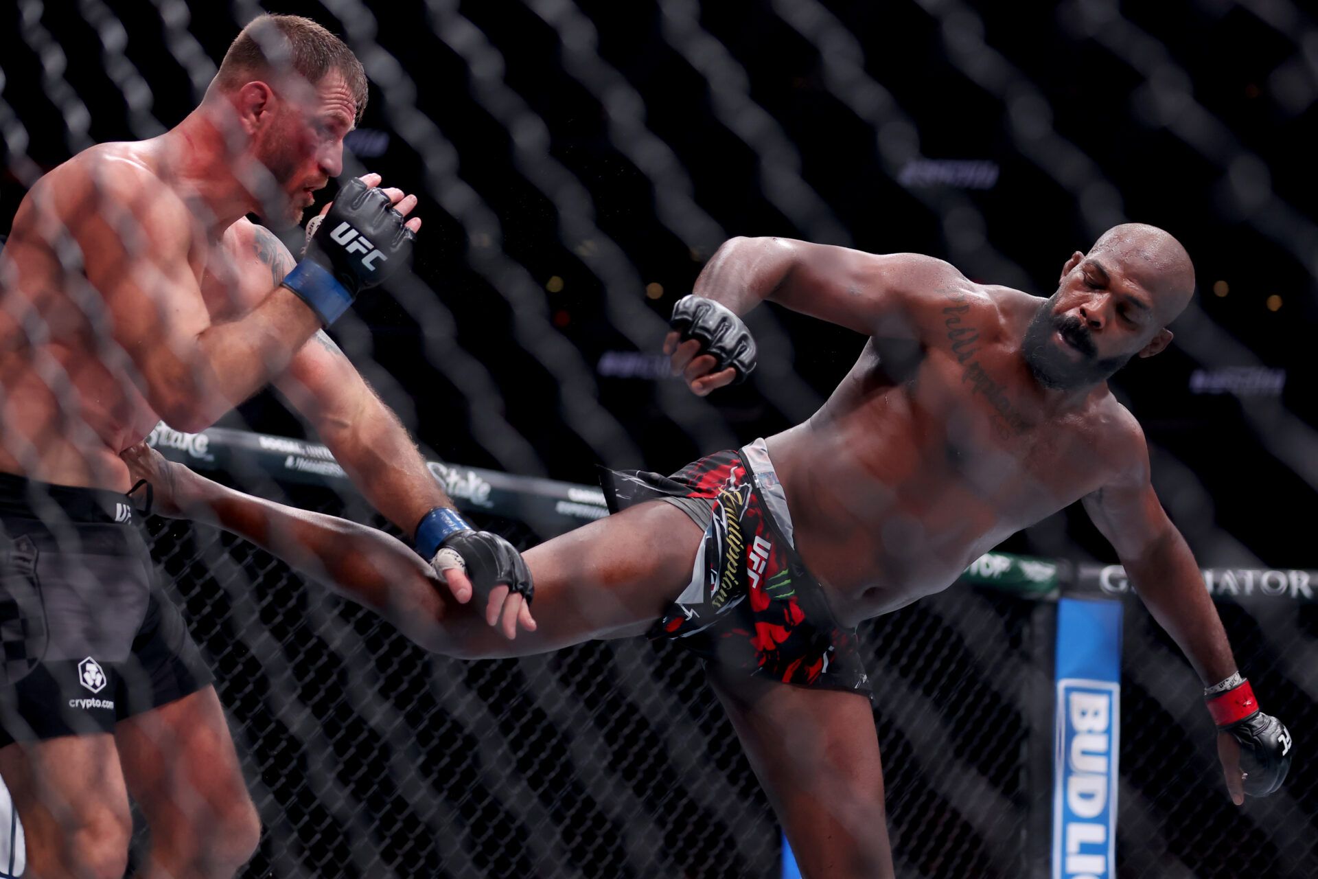 Jon Jones (red gloves) fights Stipe Miocic (blue gloves) in the heavyweight bout during UFC 309 at Madison Square Garden.