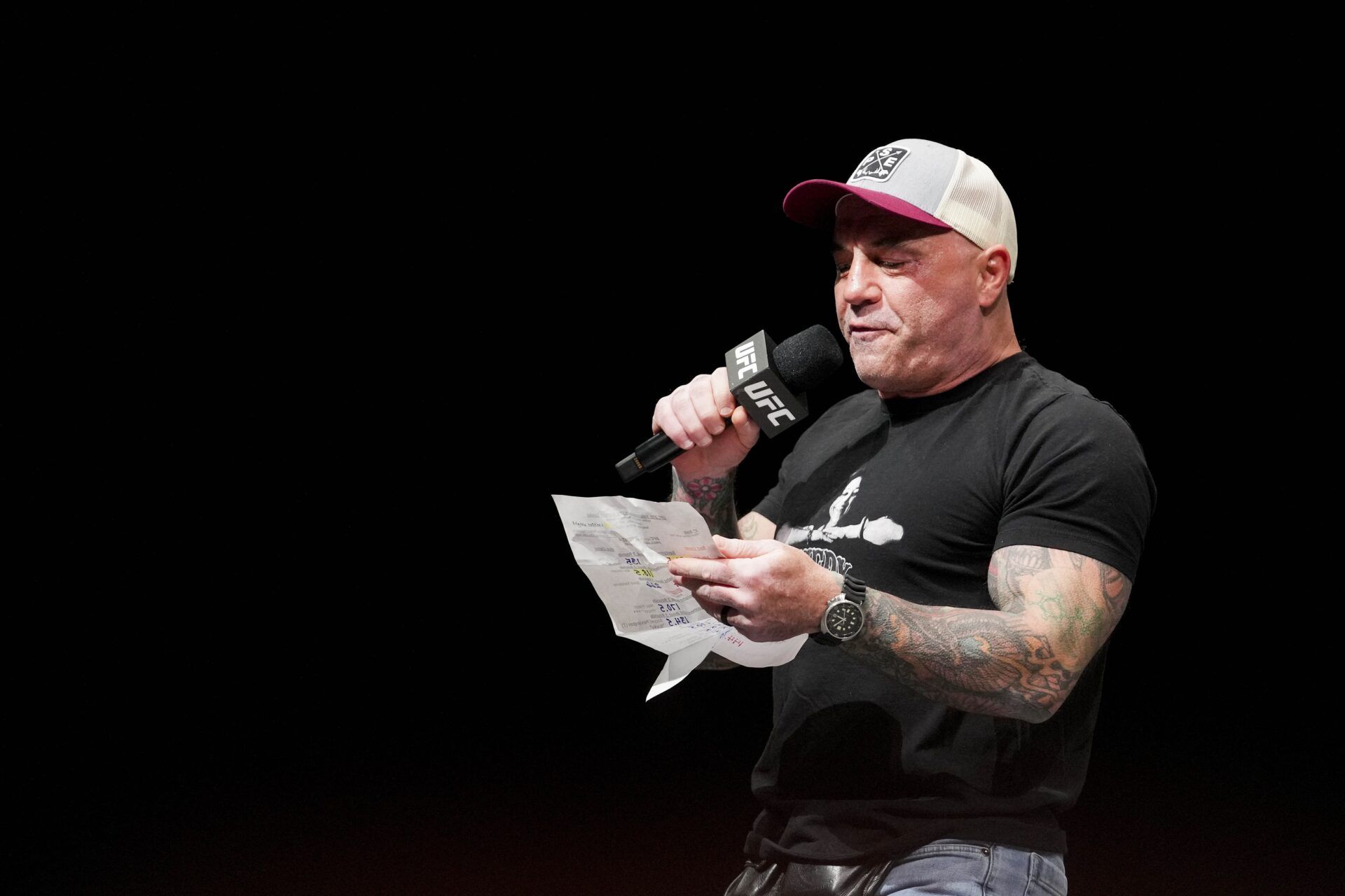 Joe Rogan introduces the contestants during weigh ins for UFC 273 at VyStar Veterans Memorial Stadium.