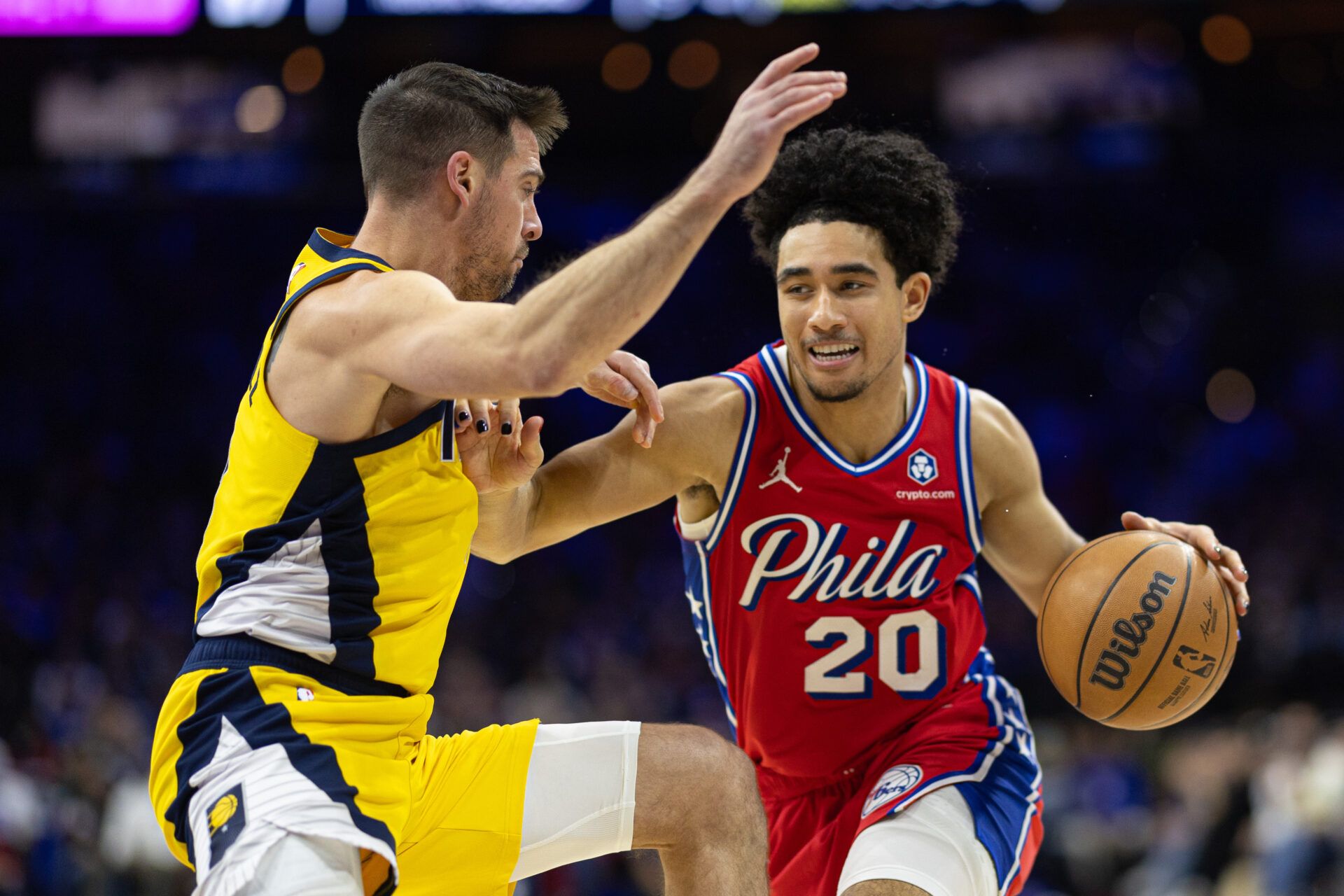 Philadelphia 76ers guard Jared McCain (20) and Indiana Pacers guard T.J. McConnell (9) in action at Wells Fargo Center.