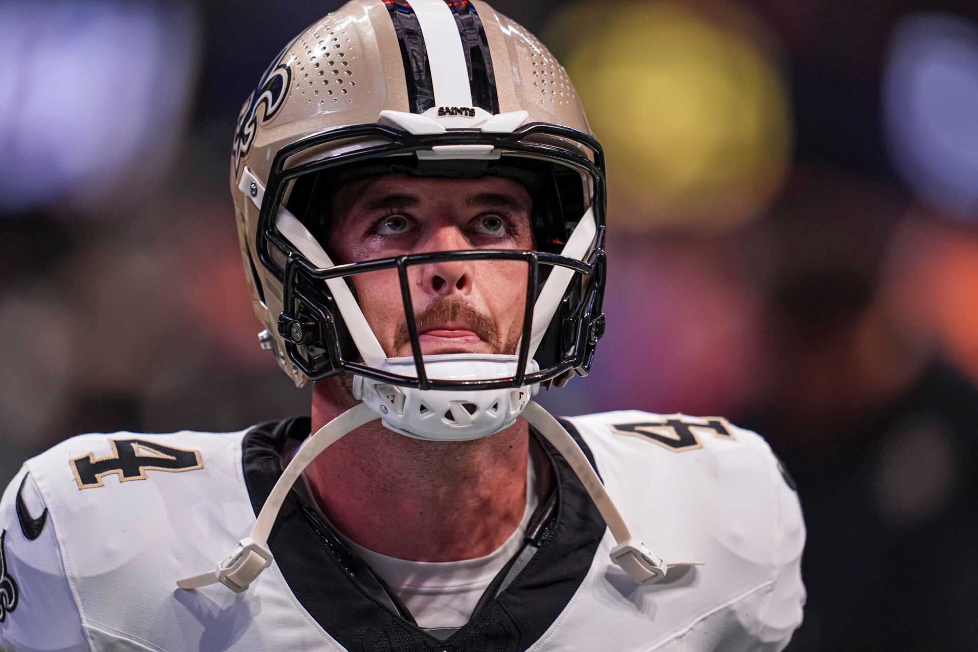 New Orleans Saints quarterback Derek Carr (4) shown on the field before the game against the Atlanta Falcons at Mercedes-Benz Stadium.