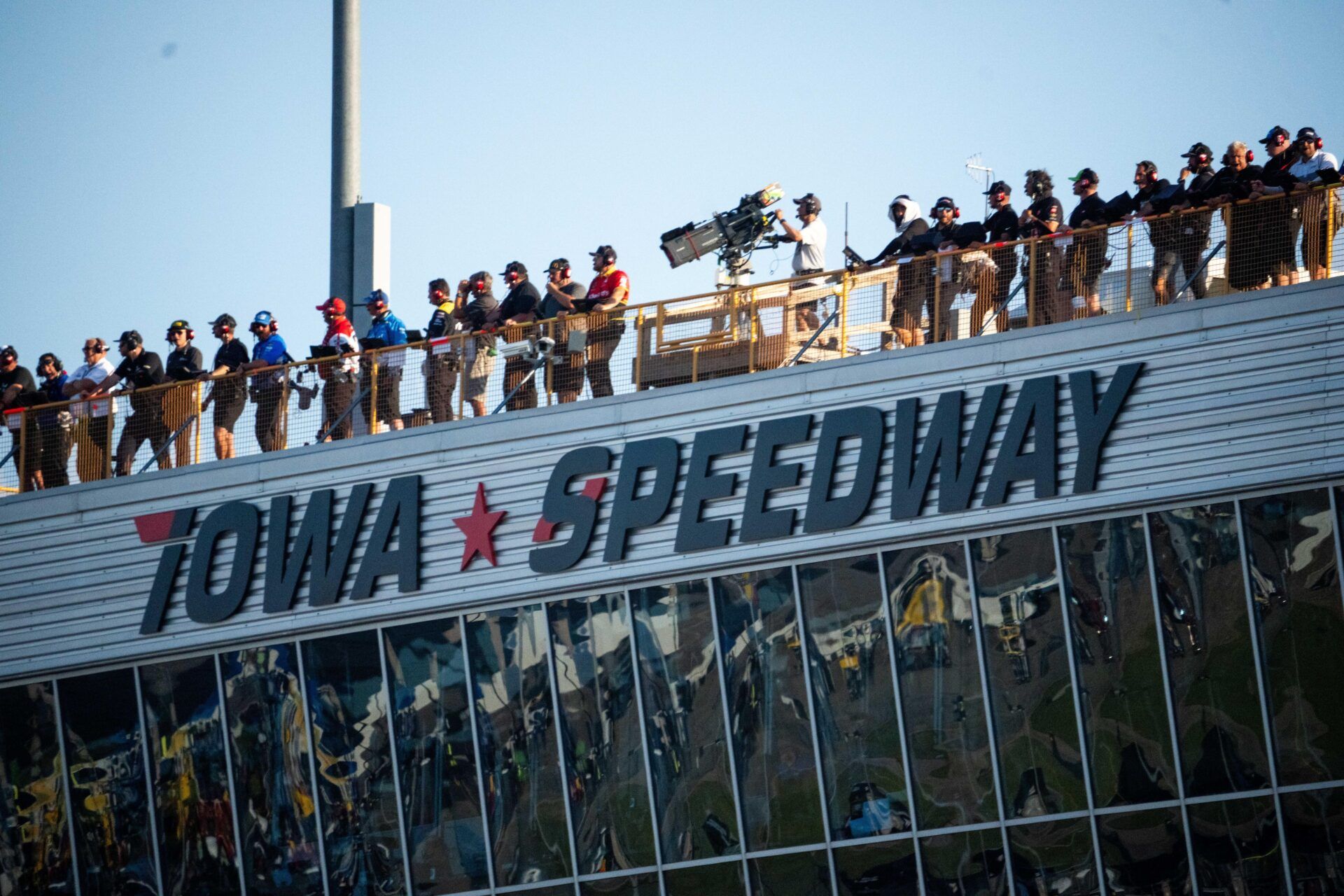 Spotters keep watch on the track during the Iowa Corn 350 on Sunday, June 16, 2024, at Iowa Speedway in Newton.