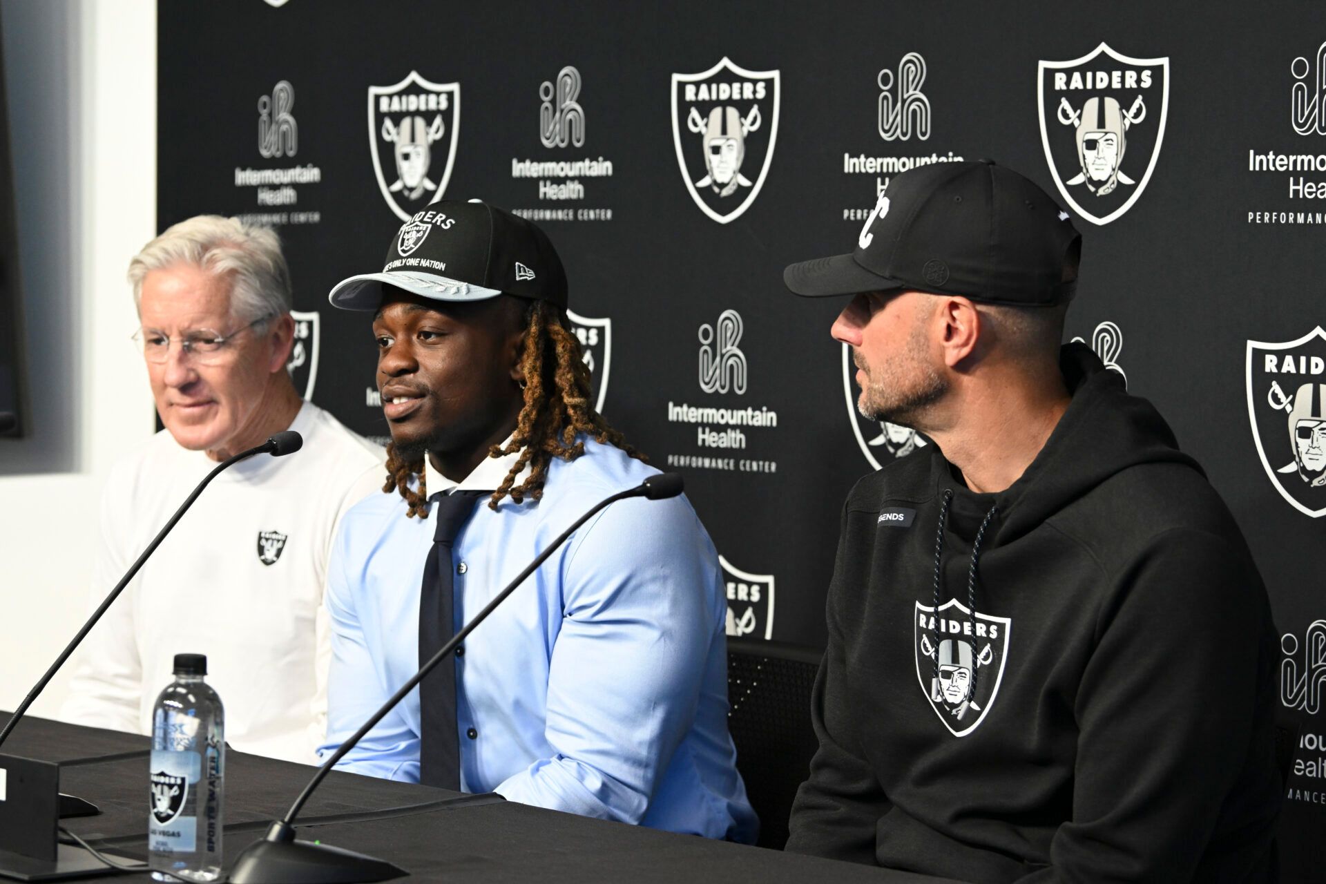(L-R) Las Vegas Raiders head coach Pete Carroll, Ashton Jeanty and general manager John Spytek during a news conference introducing Jeanty as the first round draft pick in the 2025 NFL Draft at Intermountain Health Performance Center.