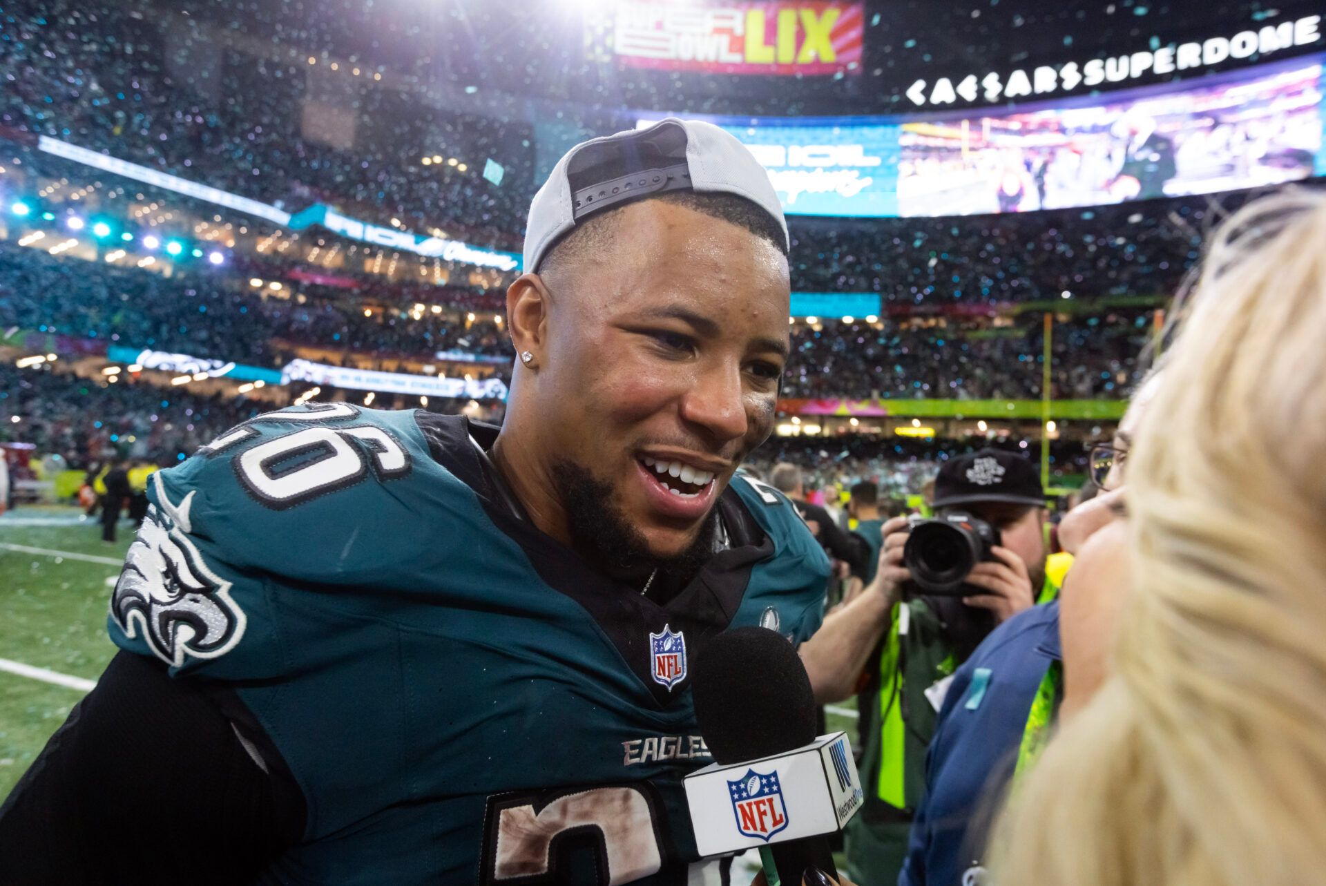 Philadelphia Eagles running back Saquon Barkley (26) celebrates after defeating the Kansas City Chiefs during Super Bowl LIX at Ceasars Superdome.