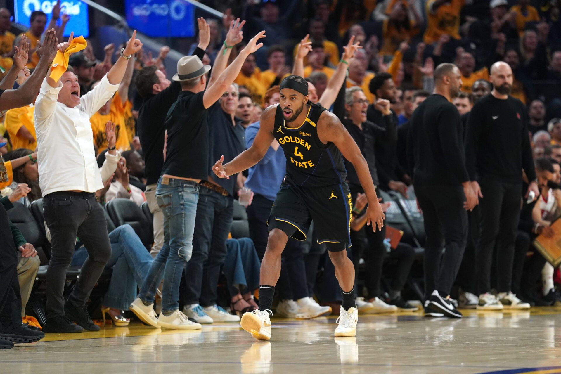 Golden State Warriors guard Moses Moody (4) reacts after making a three-point basket against the Houston Rockets in the second quarter of game six of the first round for the 2025 NBA Playoffs at Chase Center.
