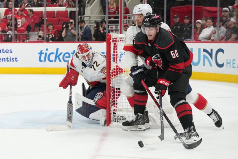 Florida Panthers goaltender Sergei Bobrovsky (72) defends against Carolina Hurricanes forward Eric Robinson (50) during the third period in game two of the Eastern Conference Final of the 2025 Stanley Cup Playoffs at Lenovo Center.