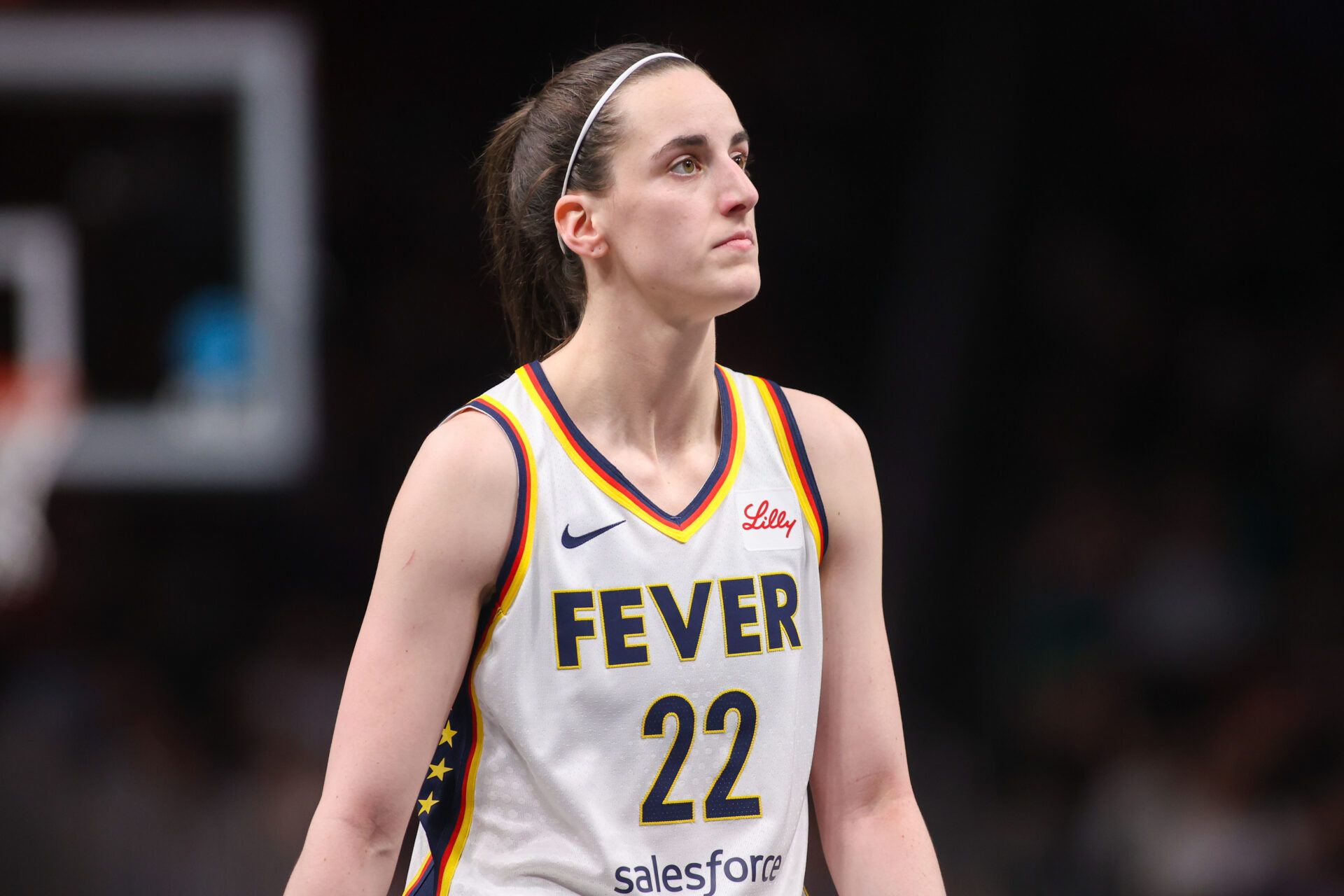 Indiana Fever guard Caitlin Clark (22) in action against the Atlanta Dream in the first half at State Farm Arena.