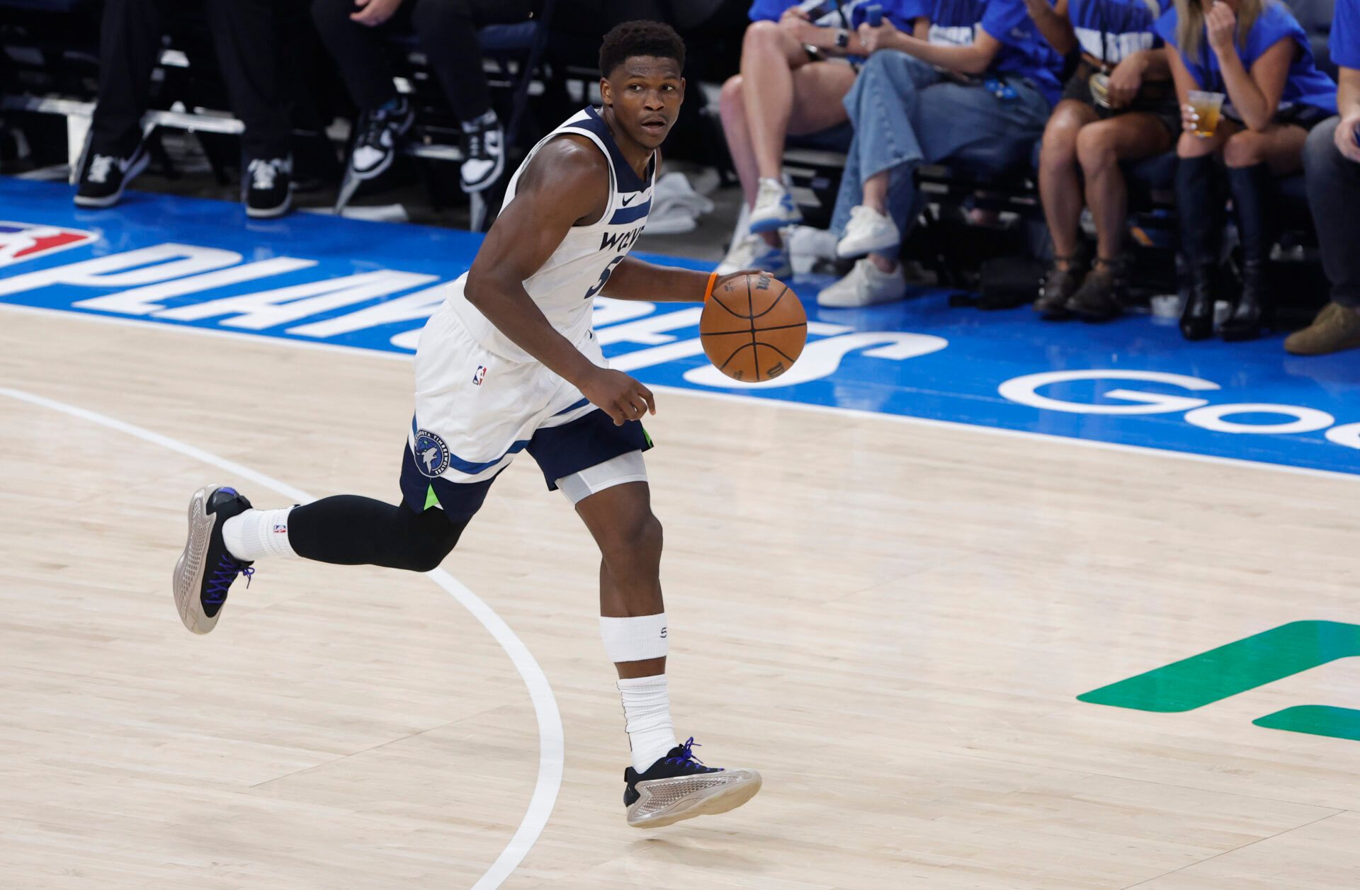 Minnesota Timberwolves guard Anthony Edwards (5) dribbles against the Oklahoma City Thunder in the second quarter during game two of the western conference finals for the 2025 NBA Playoffs at Paycom Center.