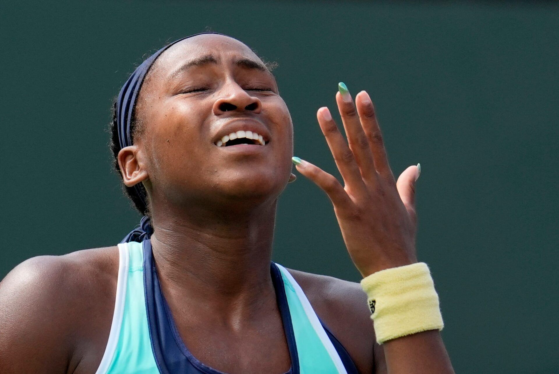 Coco Gauff reacts during the third set of her loss to Belinda Bencic on Stadium 1 at the BNP Paribas Open in Indian Wells, Calif., on Wed., March 12, 2025.