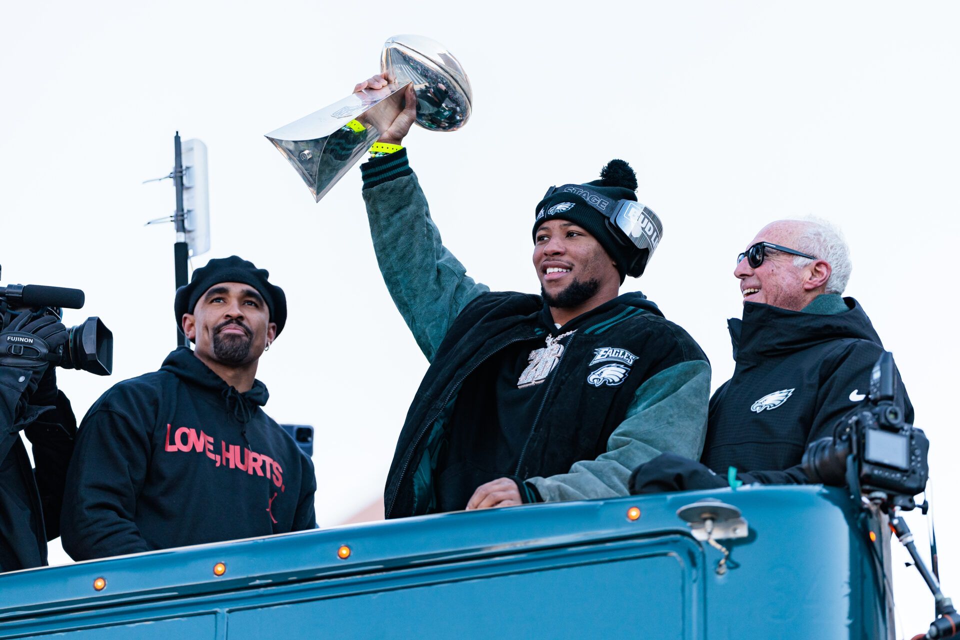 Philadelphia Eagles running back Saquon Barkley (26) lifts the Lombardi Trophy during the Super Bowl LIX championship parade and rally.