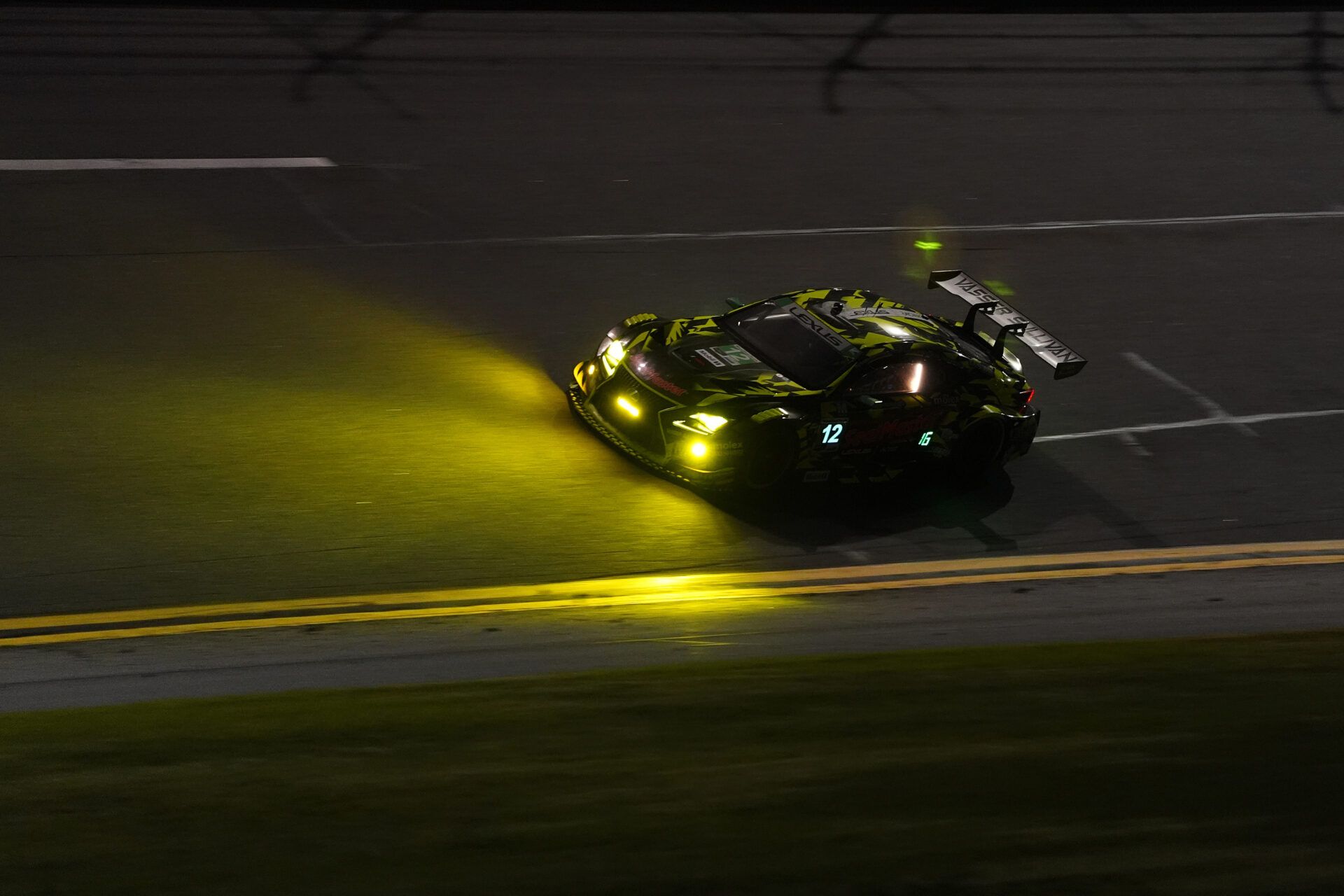 Vasser Sullivan Lexus RC F GT3 of Frankie Montecalvo, Parker Thompson, Jack Hawksworth, and Kyle Kirkwood (12) races during the Rolex 24 at Daytona International Speedway.