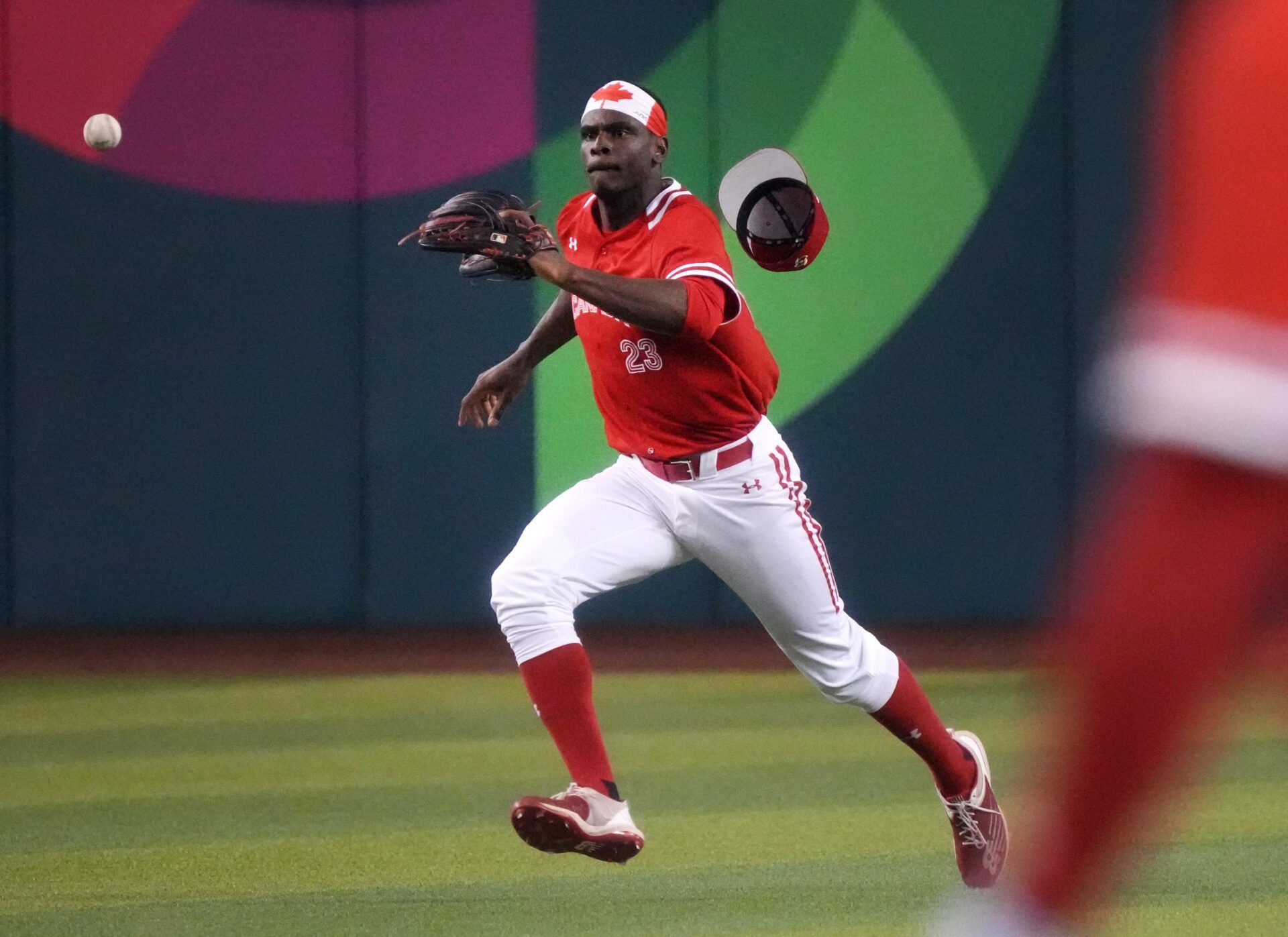 Canada's Denzel Clarke (23) chases down a line drive against Mexico during their World Baseball Classic game at Chase Field in Phoenix on March 15, 2023.

Baseball World Baseball Classic Final Day