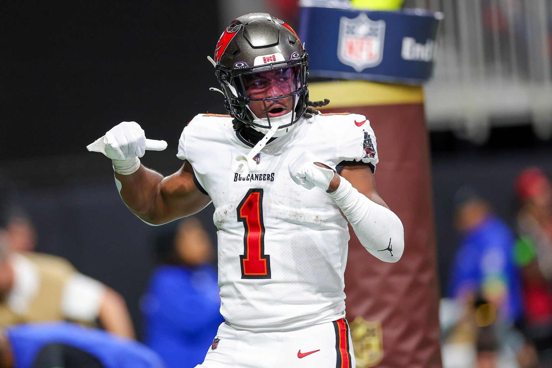 ATLANTA, GEORGIA - DECEMBER 10: Rachaad White #1 of the Tampa Bay Buccaneers reacts after rushing for a touchdown during the second half against the Atlanta Falcons at Mercedes-Benz Stadium on December 10, 2023 in Atlanta, Georgia. (Photo by Kevin C. Cox/Getty Images)