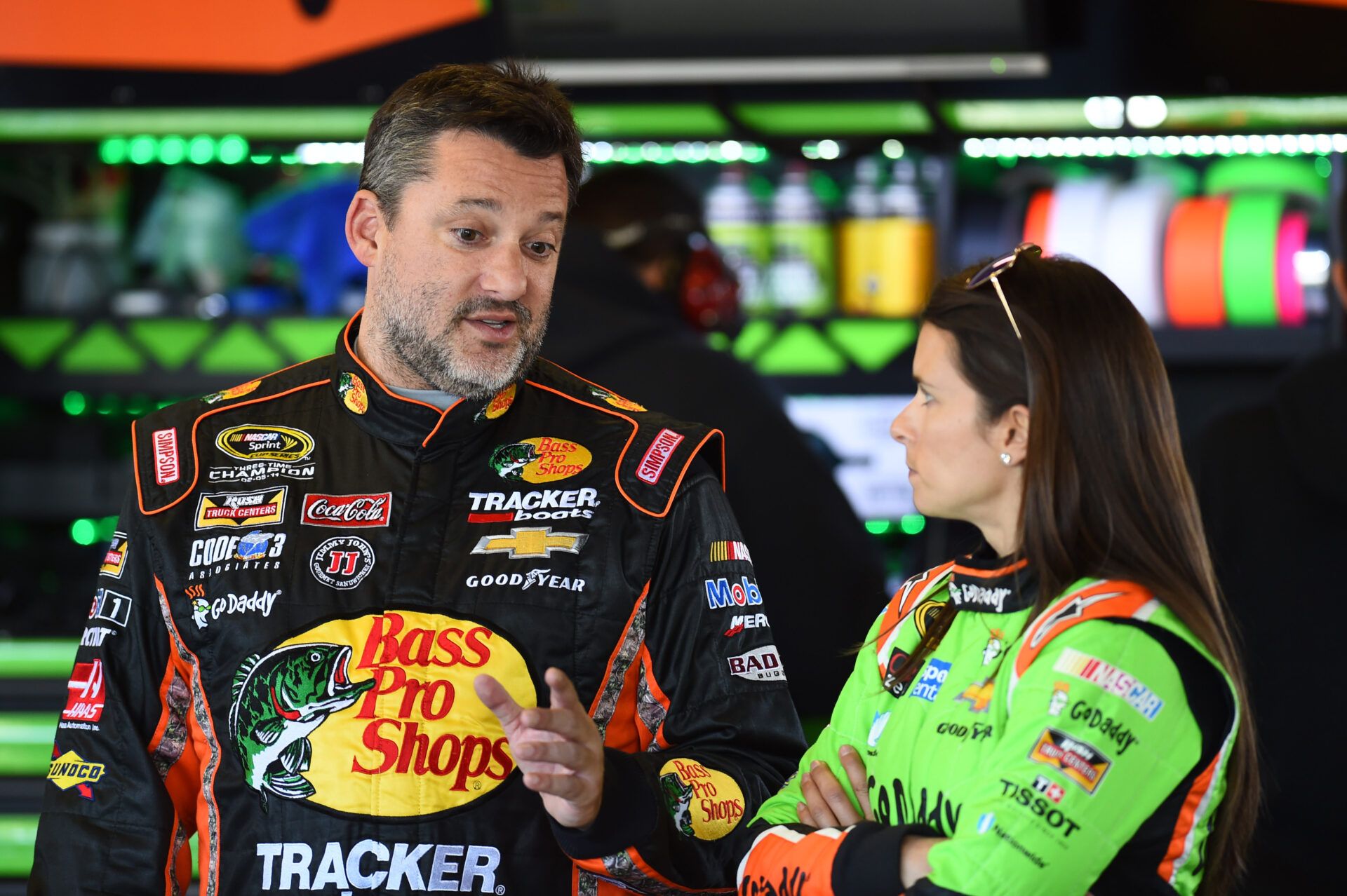 NASCAR Sprint Cup Series drivers Danica Patrick (10) and Tony Stewart (14) during practice for the Daytona 500 at Daytona International Speedway.