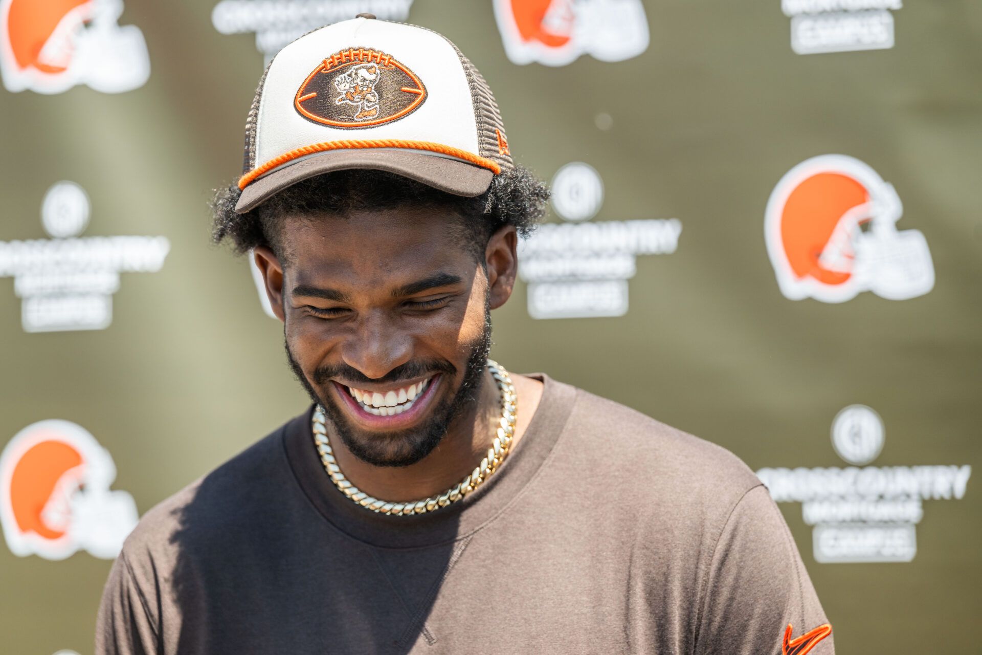 Cleveland Browns quarterback Shedeur Sanders (12) talks to the media during rookie minicamp at CrossCountry Mortgage Campus.