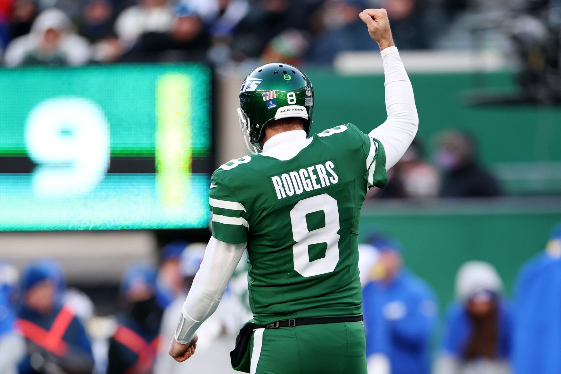 EAST RUTHERFORD, NEW JERSEY - DECEMBER 22: Aaron Rodgers #8 of the New York Jets reacts during a game against the Los Angeles Rams at MetLife Stadium on December 22, 2024 in East Rutherford, New Jersey. (Photo by Emilee Chinn/Getty Images)