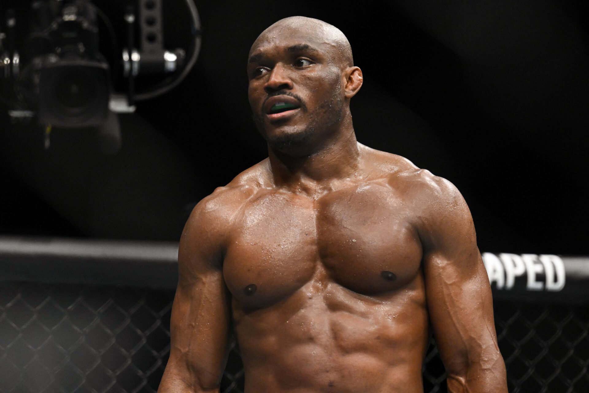 Kamaru Usman reacts during his fight with Leon Edwards (not pictured) during UFC 286 at O2 Arena.