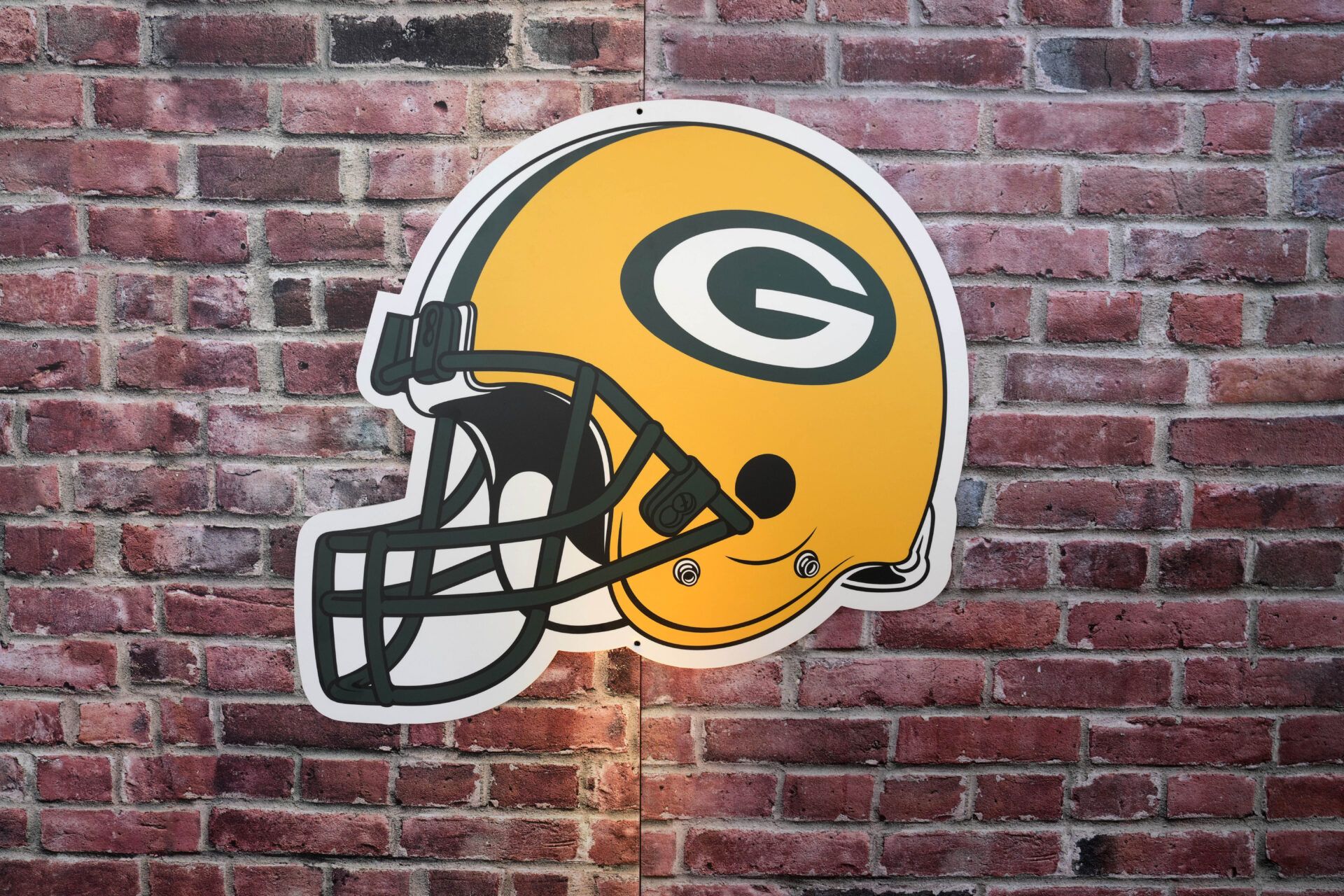 A Green Bay Packers logo helmet at the Packer Everywhere Draft Haus at the NFL Draft Experience at Lambeau Field.