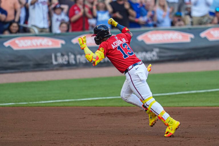Atlanta Braves right fielder Ronald Acuna Jr (13) reacts after hitting a lead off home run  against the San Diego Padres during the first inning at Truist Park.