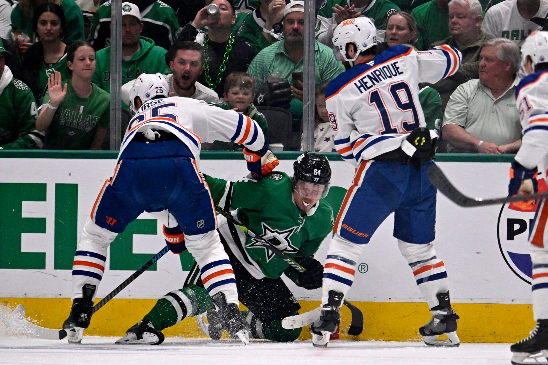 Edmonton Oilers defenseman Darnell Nurse (25) punches Dallas Stars center Mikael Granlund (64) in the first period for game two of the Western Conference Final of the 2025 Stanley Cup Playoffs at American Airlines Center.