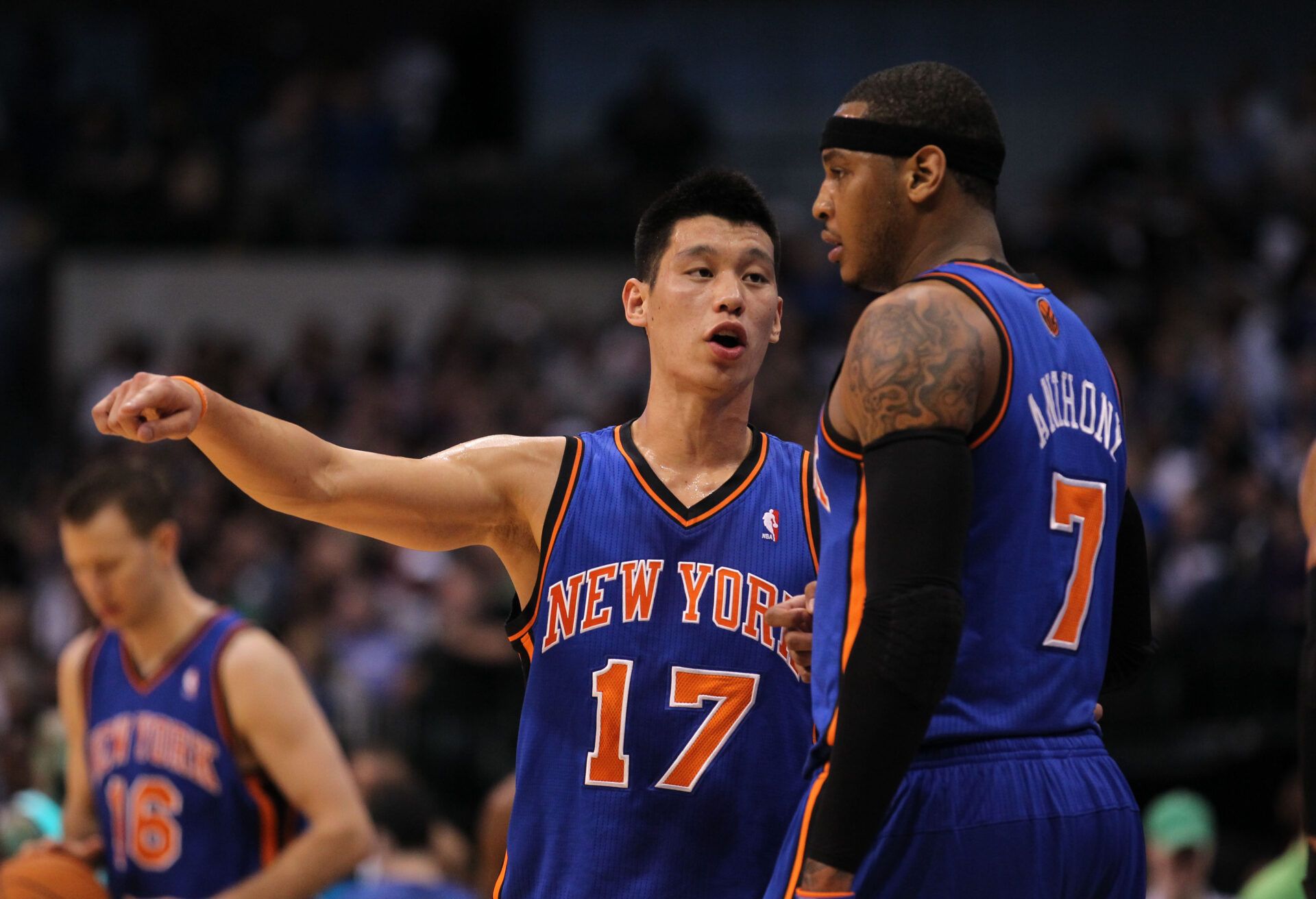 New York Knicks guard Jeremy Lin (17) talks with forward Carmelo Anthony (7) in the first quarter against the Dallas Mavericks at American Airlines Center.
