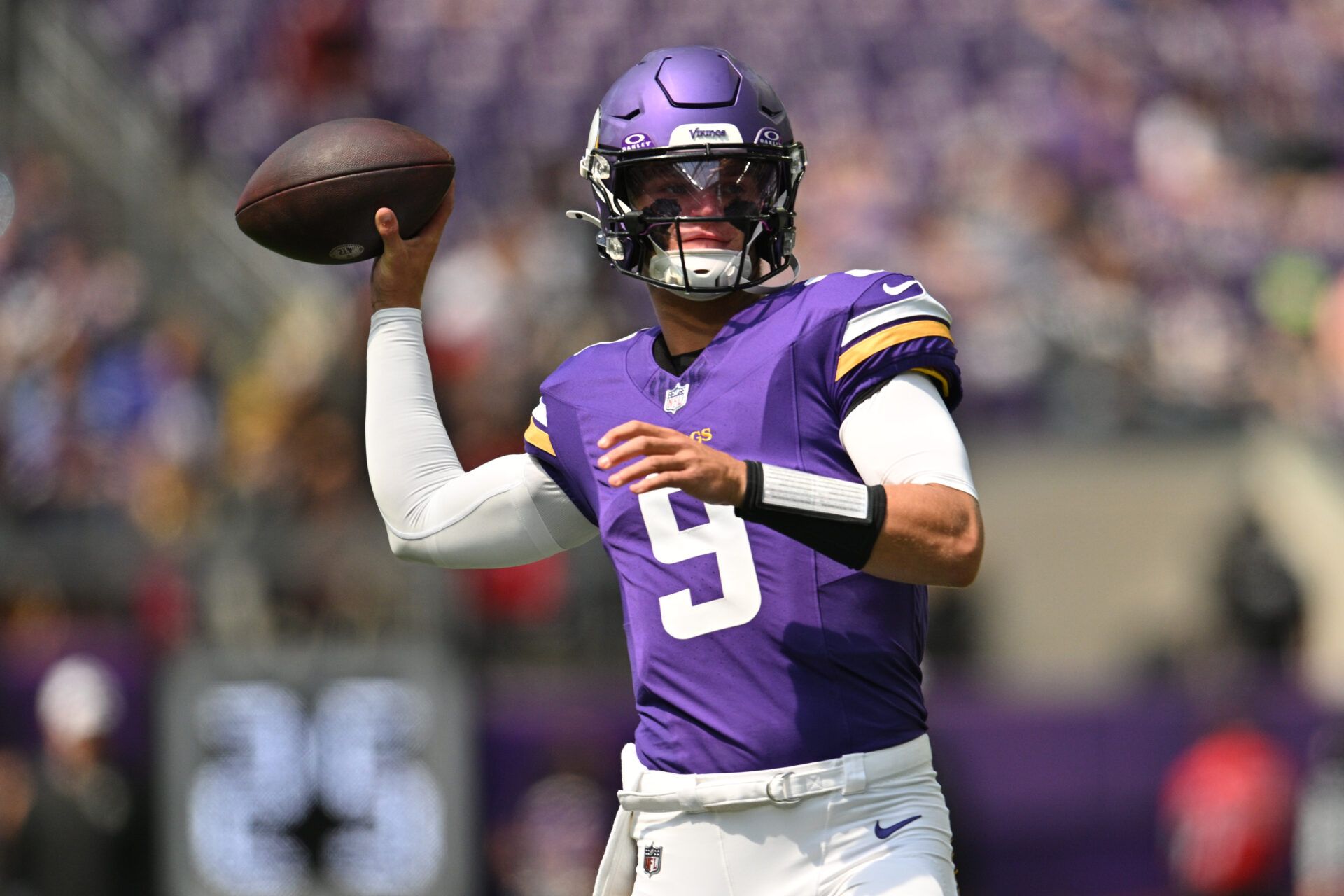 Minnesota Vikings quarterback J.J. McCarthy (9) warms up before the game against the Las Vegas Raiders at U.S. Bank Stadium.