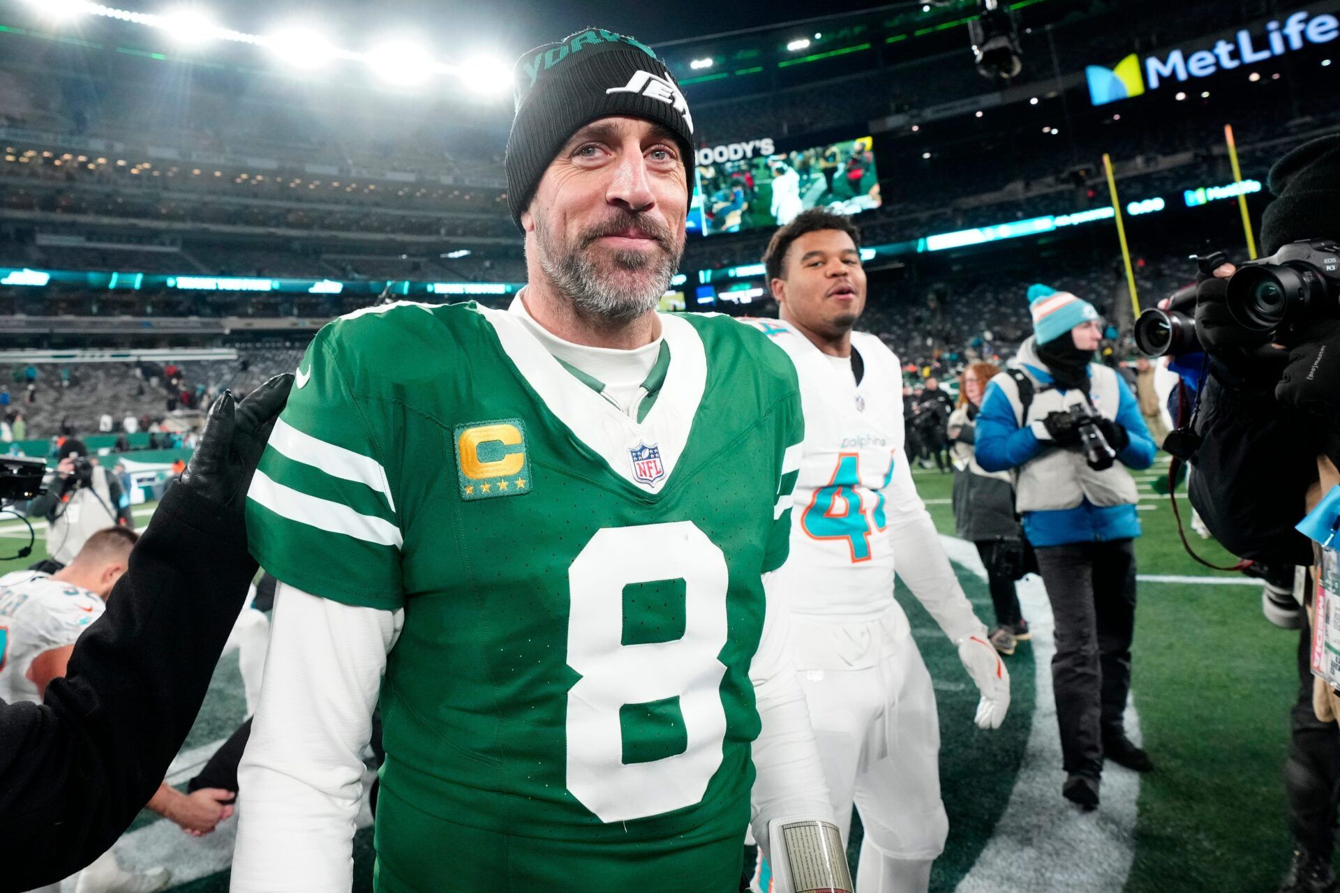 New York Jets quarterback Aaron Rodgers (8) is shown after he led Gang Green to a 32-20 victory against the Miami Dolphins, on Jan. 5, 2025, in East Rutherford, N.J. Kevin R. Wexler / USA TODAY NETWORK via Imagn Images