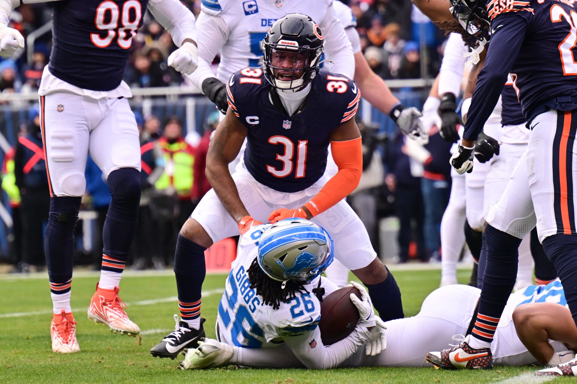 Chicago Bears free safety Kevin Byard (31) celebrates his defensive stop of Detroit Lions running back Jahmyr Gibbs (26) during the first quarter at Soldier Field.