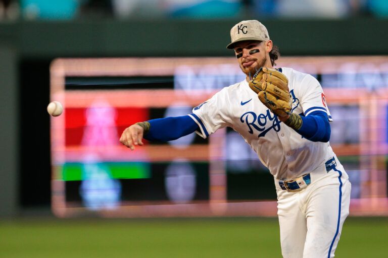 Kansas City Royals shortstop Bobby Witt Jr. (7) throws to first base during the ninth inning against the St. Louis Cardinals at Kauffman Stadium.