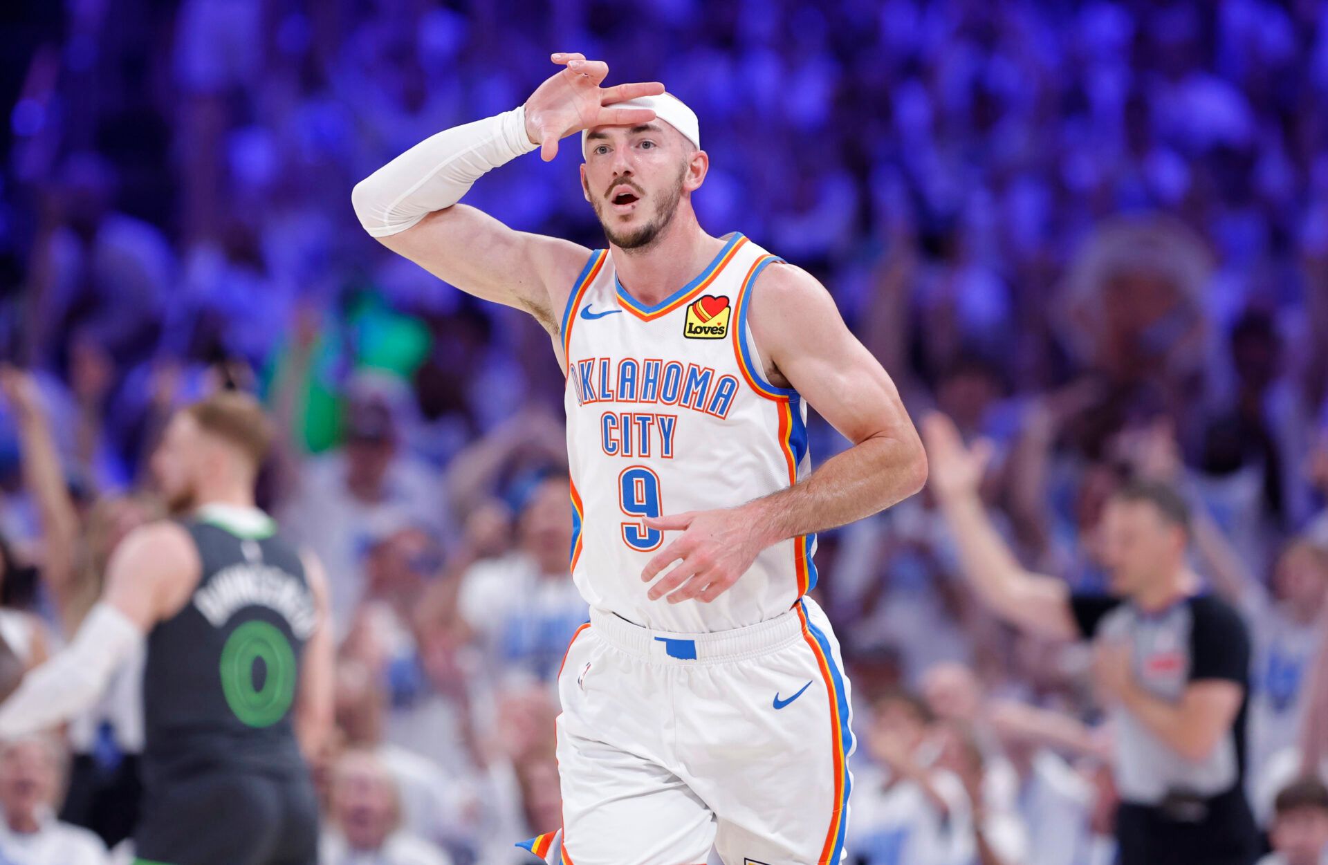 Oklahoma City Thunder guard Alex Caruso (9) reacts after scoring a three point basket against the Minnesota Timberwolves in the second quarter during game one of the western conference finals for the 2025 NBA Playoffs at Paycom Center.
