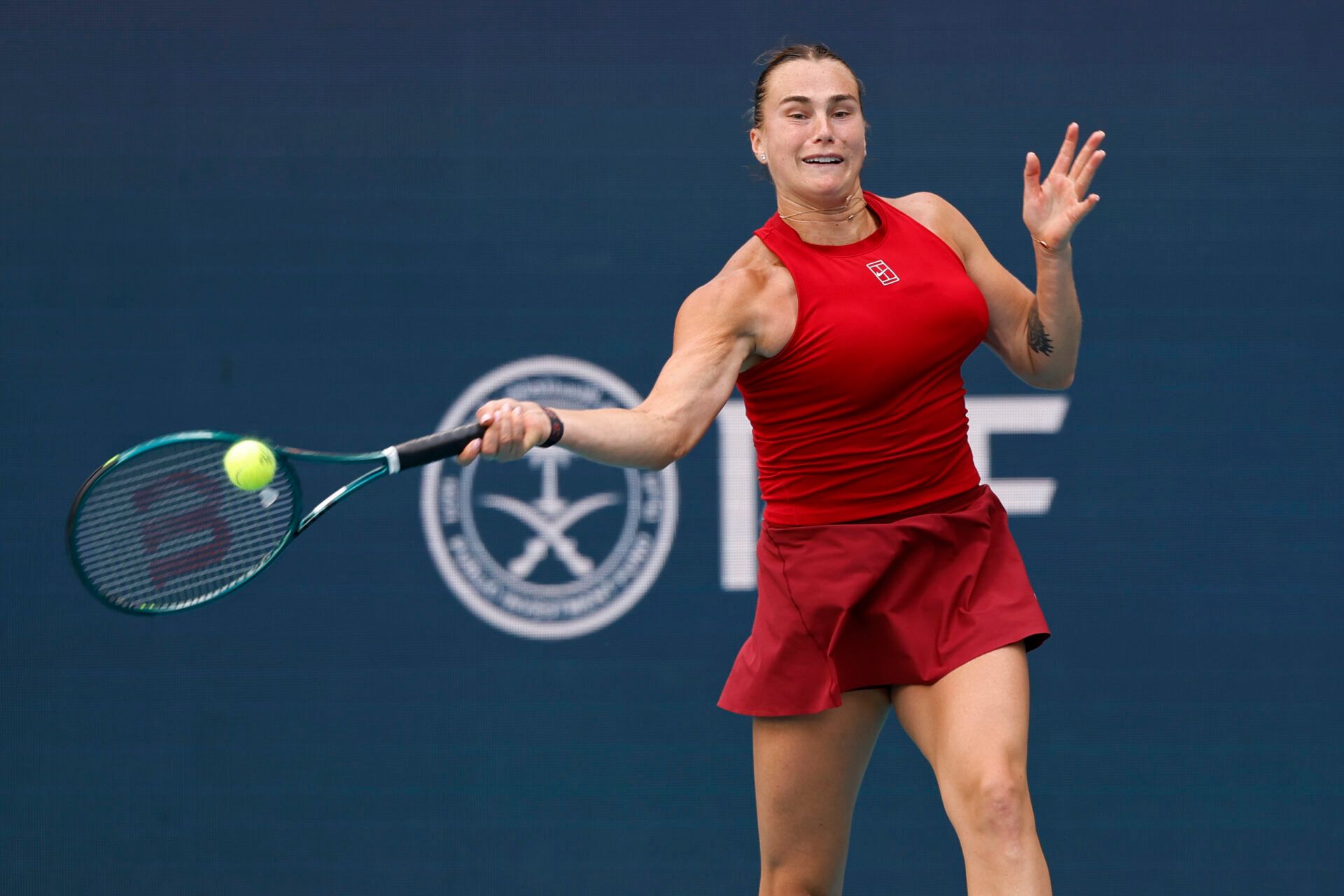 Aryna Sabalenka hits a forehand against Jasmine Paolini (ITA)(not pictured) in a women's singles semifinal on day ten of the Miami Open at Hard Rock Stadium.