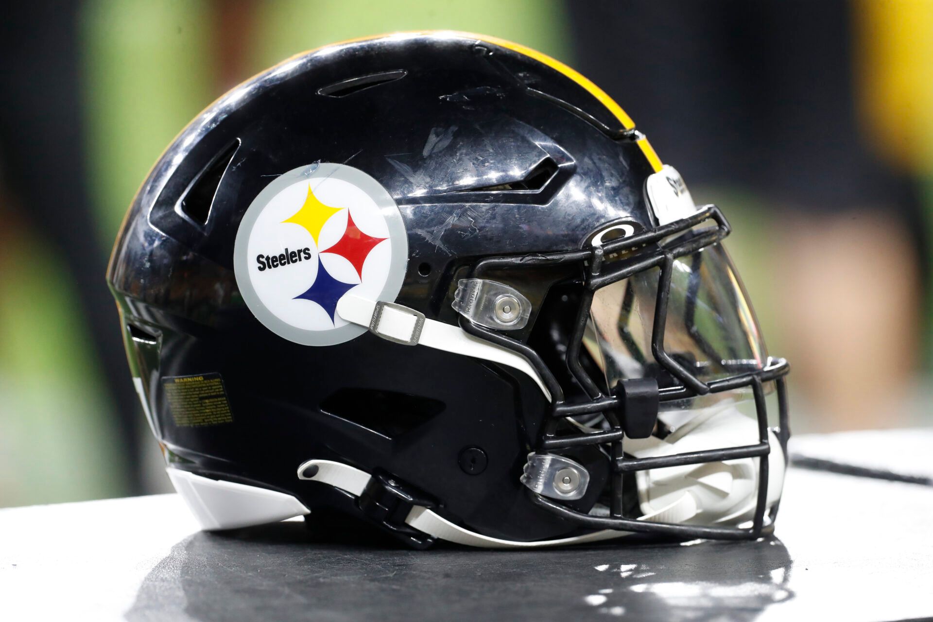 A Pittsburgh Steelers helmet sits on an equipment trunk during the game against the Houston Texans during the fourth quarter at Acrisure Stadium.