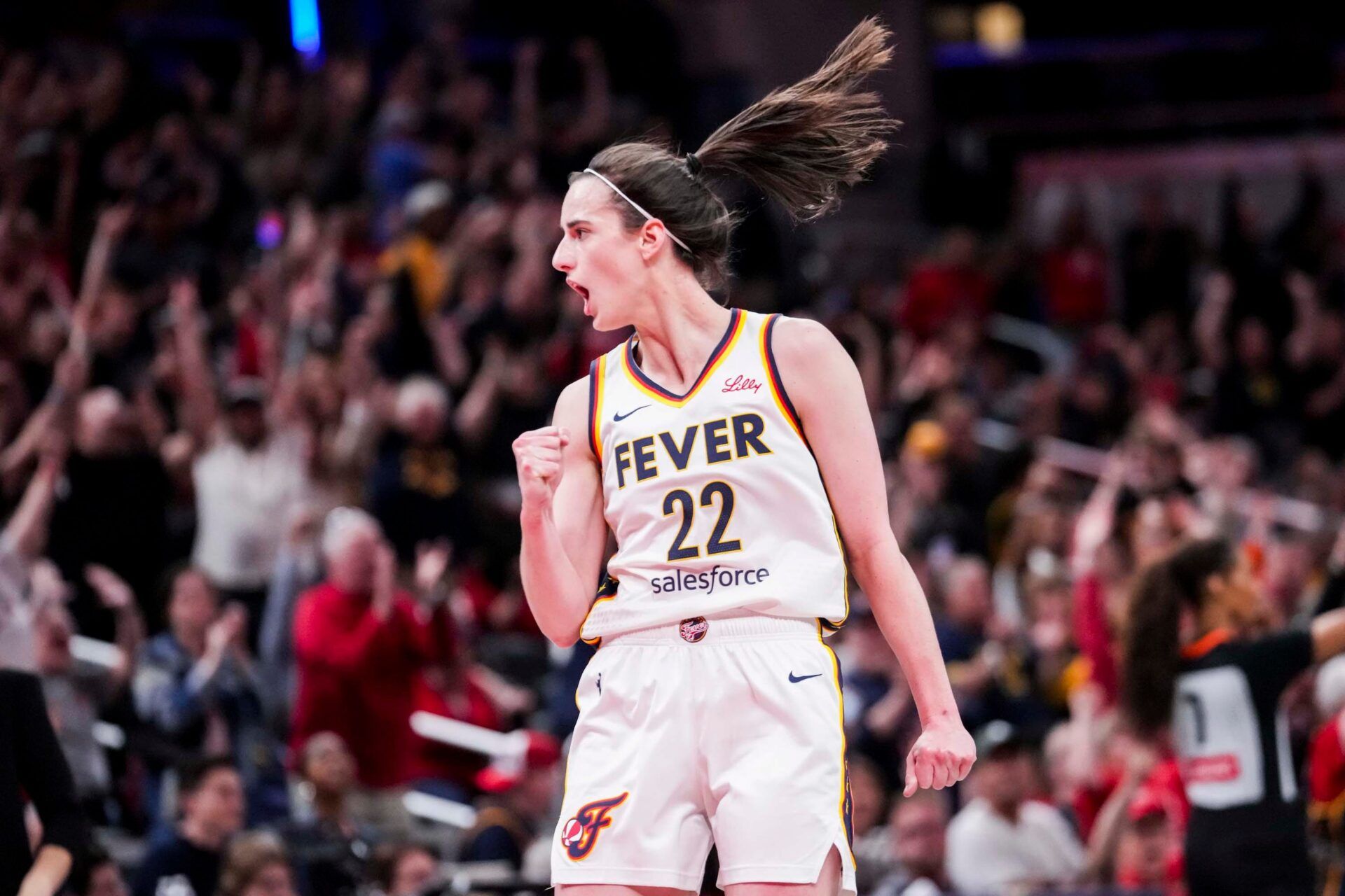Indiana Fever guard Caitlin Clark (22) celebrates Saturday, May 24, 2025, during a game between the Indiana Fever and the New York Liberty at Gainbridge Fieldhouse in Indianapolis. The New York Liberty defeated the Indiana Fever, 90-88.