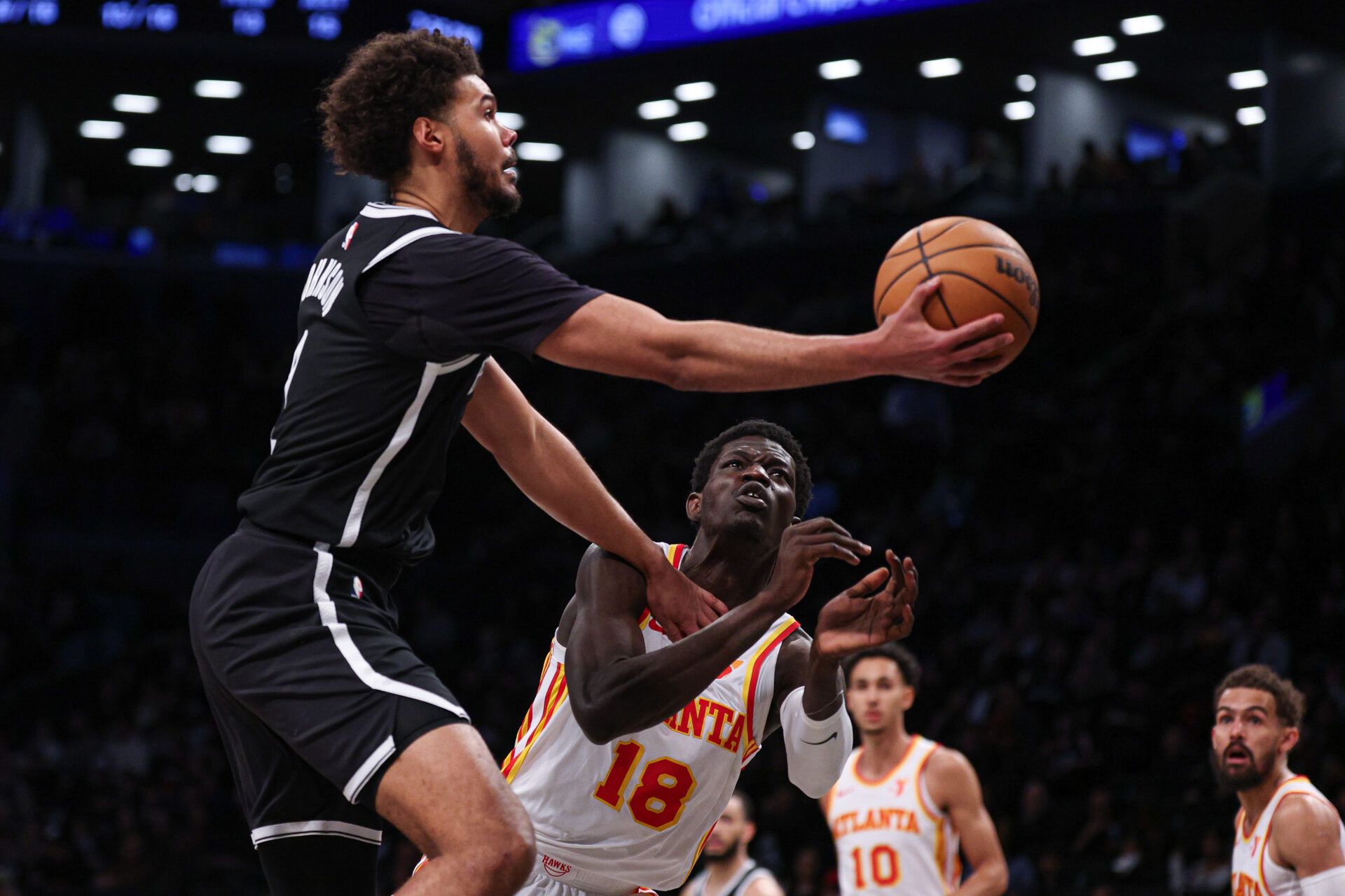 Brooklyn Nets forward Cameron Johnson (2) goes to the basket against Atlanta Hawks forward Mouhamed Gueye (18) during the second half at Barclays Center.