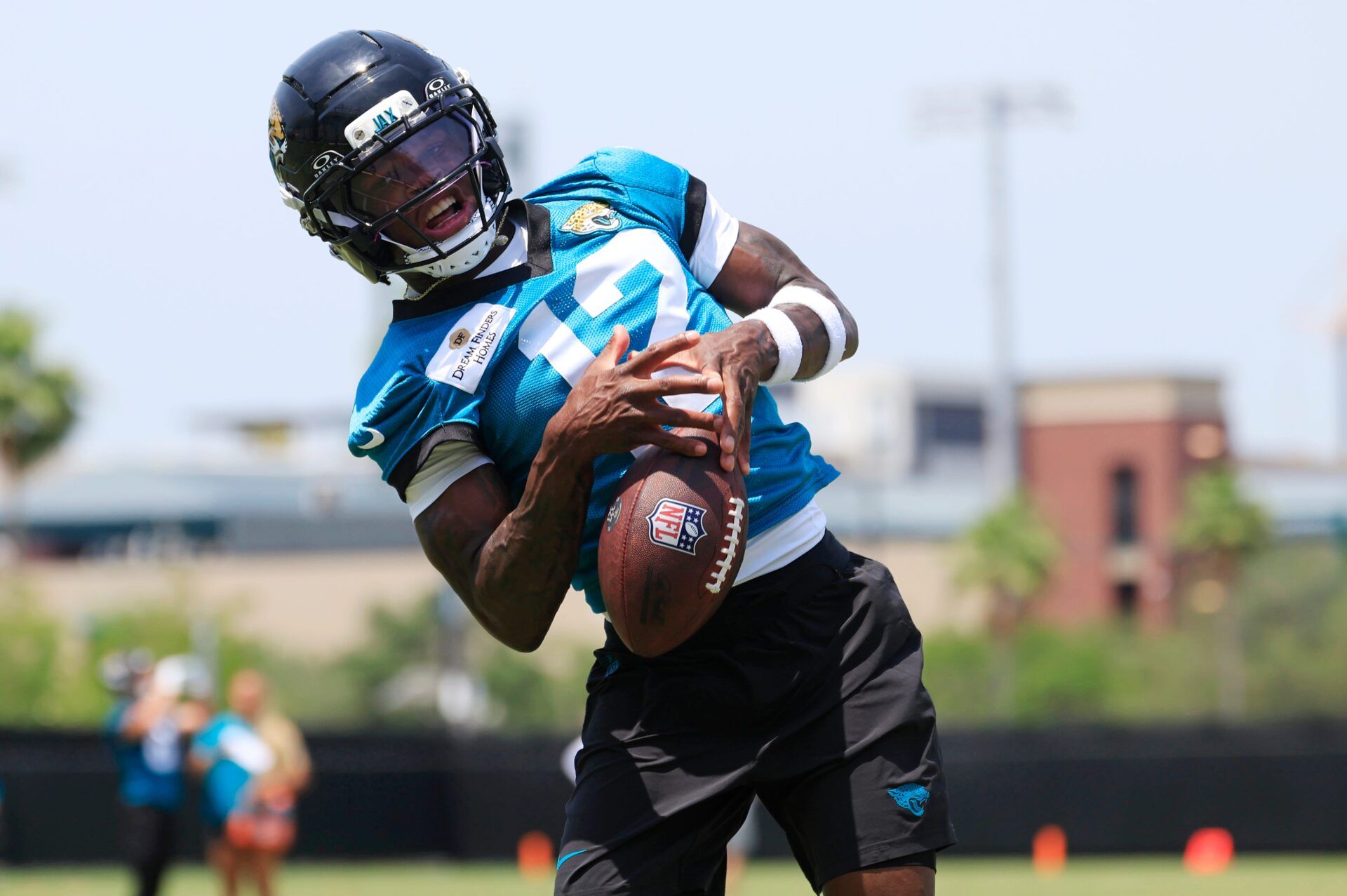 Jacksonville Jaguars wide receiver Travis Hunter (12) can't haul in a reception during the first organized team activity at Miller Electric Center Monday, May 19, 2025 in Jacksonville, Fla. Corey Perrine/Florida Times-Union / USA TODAY NETWORK via Imagn Images