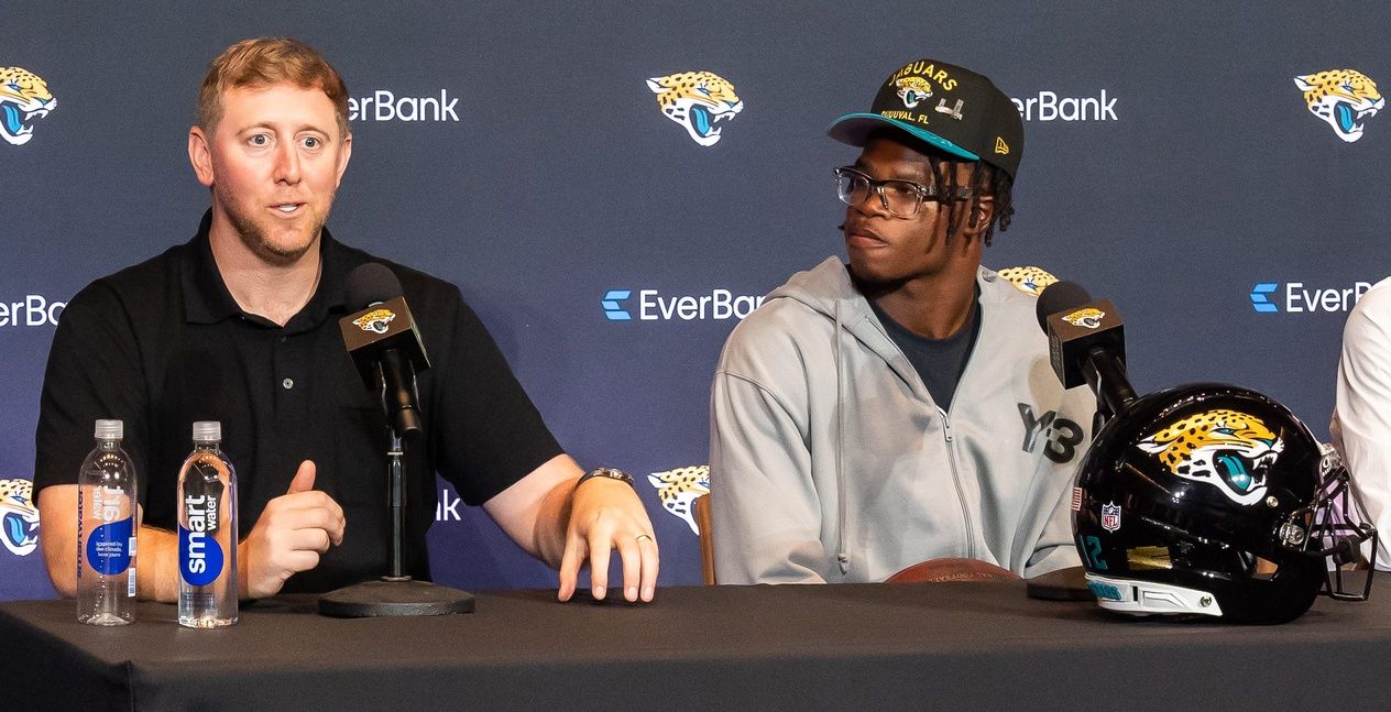 Jacksonville Jaguars Head Coach Liam Coen, left, answers questions during a press conference with the team’s first-round pick, Colorado Buffaloes wide receiver and defensive back Travis Hunter, right, Friday, March 25, 2025 at Miller Electric Center in Jacksonville, Fla. [Doug Engle/Florida Times-Union]