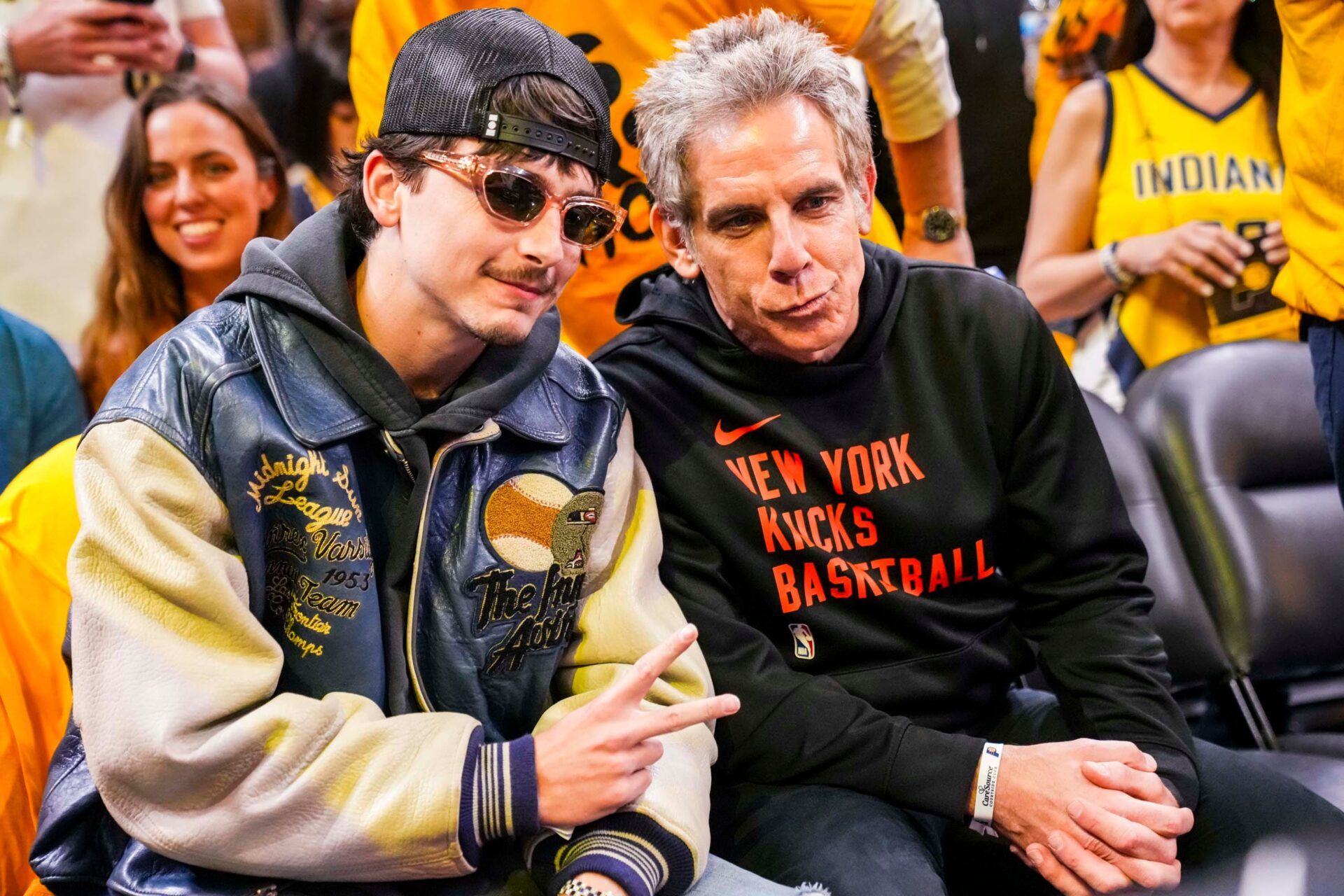 Actors Timothée Chalamet and Ben Stiller pose for a photographer Tuesday, May 27, 2025, before Game 4 of the NBA Eastern Conference Finals at Gainbridge Fieldhouse in Indianapolis.