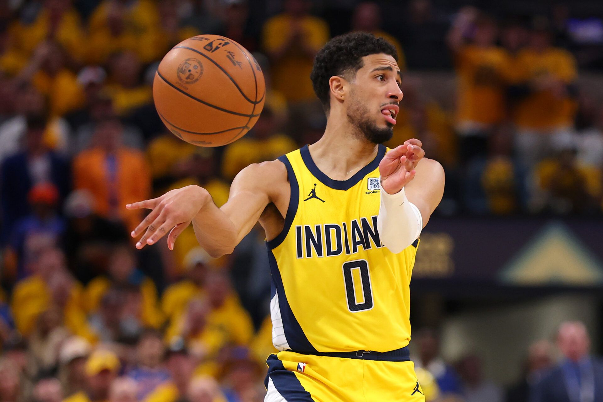 INDIANAPOLIS, INDIANA - MAY 27:  Tyrese Haliburton #0 of the Indiana Pacers attempts a pass against the New York Knicks during the first quarter in Game Four of the Eastern Conference Finals of the 2025 NBA Playoffs at Gainbridge Fieldhouse on May 27, 2025 in Indianapolis, Indiana. NOTE TO USER: User expressly acknowledges and agrees that, by downloading and or using this photograph, User is consenting to the terms and conditions of the Getty Images License Agreement. (Photo by Gregory Shamus/Getty Images)