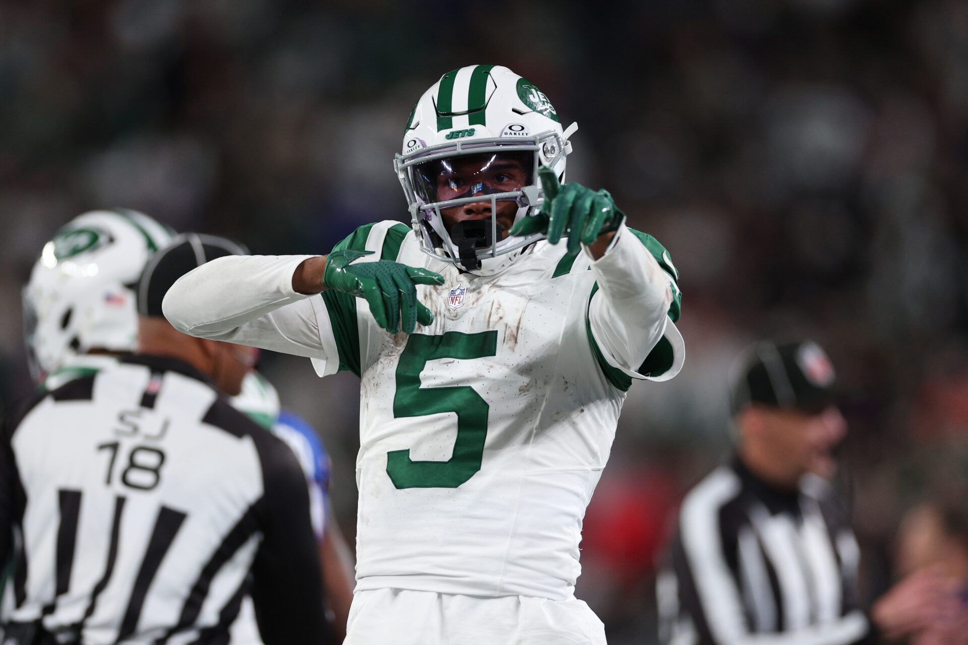 EAST RUTHERFORD, NEW JERSEY - OCTOBER 14: Garrett Wilson #5 of the New York Jets reacts after a first down during the third quarter against the Buffalo Bills at MetLife Stadium on October 14, 2024 in East Rutherford, New Jersey. (Photo by Elsa/Getty Images)