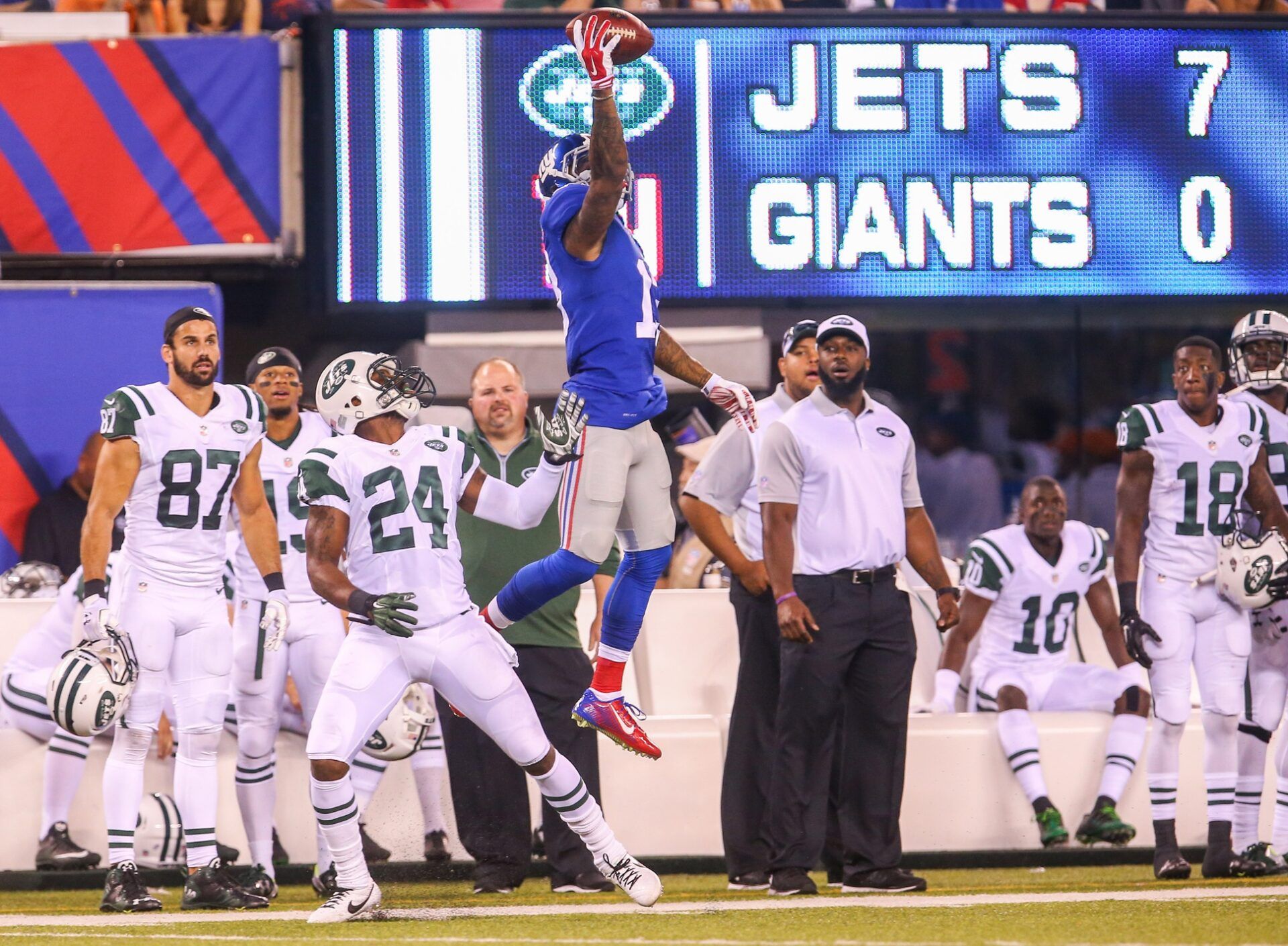 New York Giants wide receiver Odell Beckham Jr. (13) makes a one handed catch over New York Jets defensive back Darrelle Revis (24) but lands out of bounds during the first half at MetLife Stadium.
