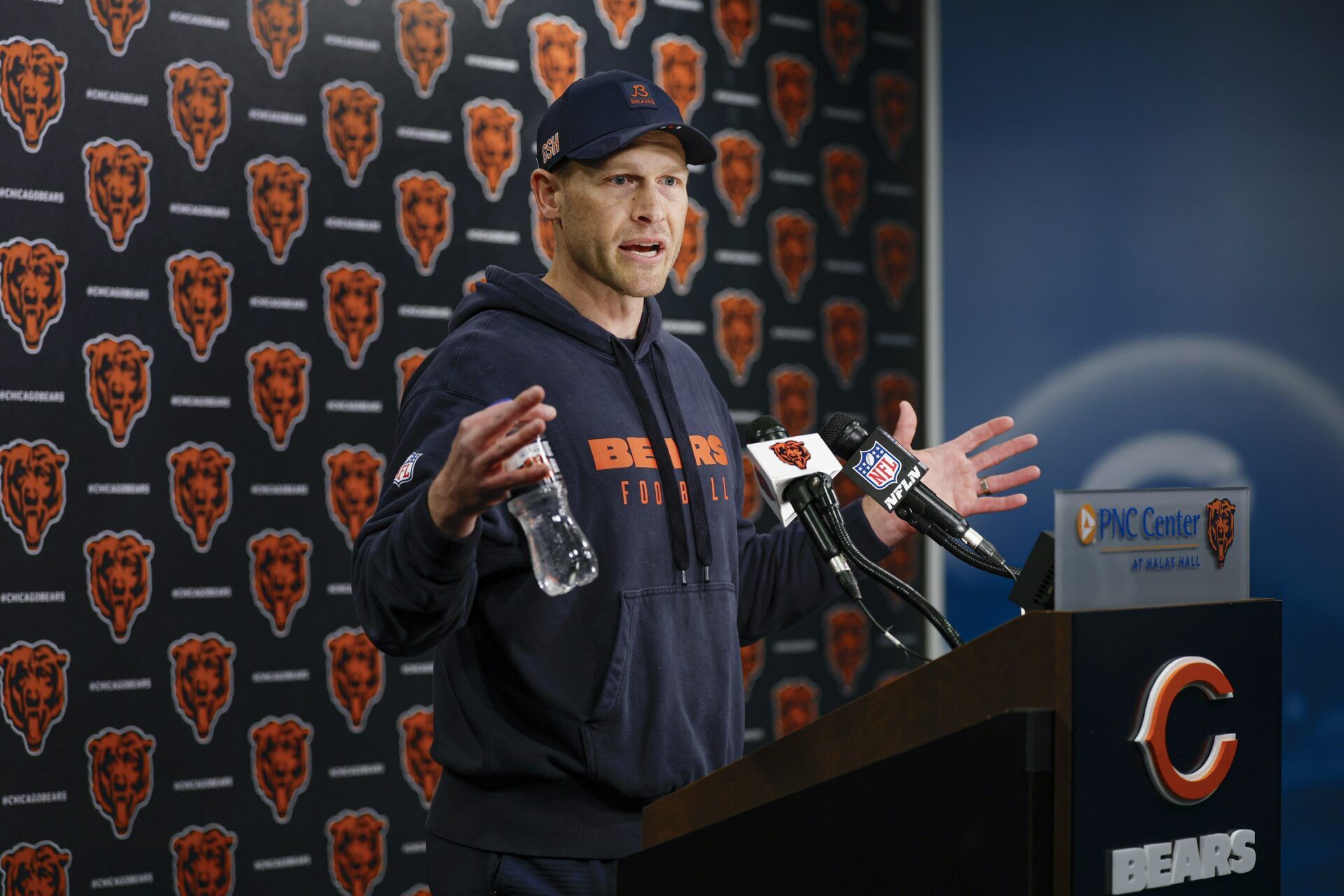 Chicago Bears head coach Ben Johnson (R) speaks during the Rookie Minicamp at Halas Hall.