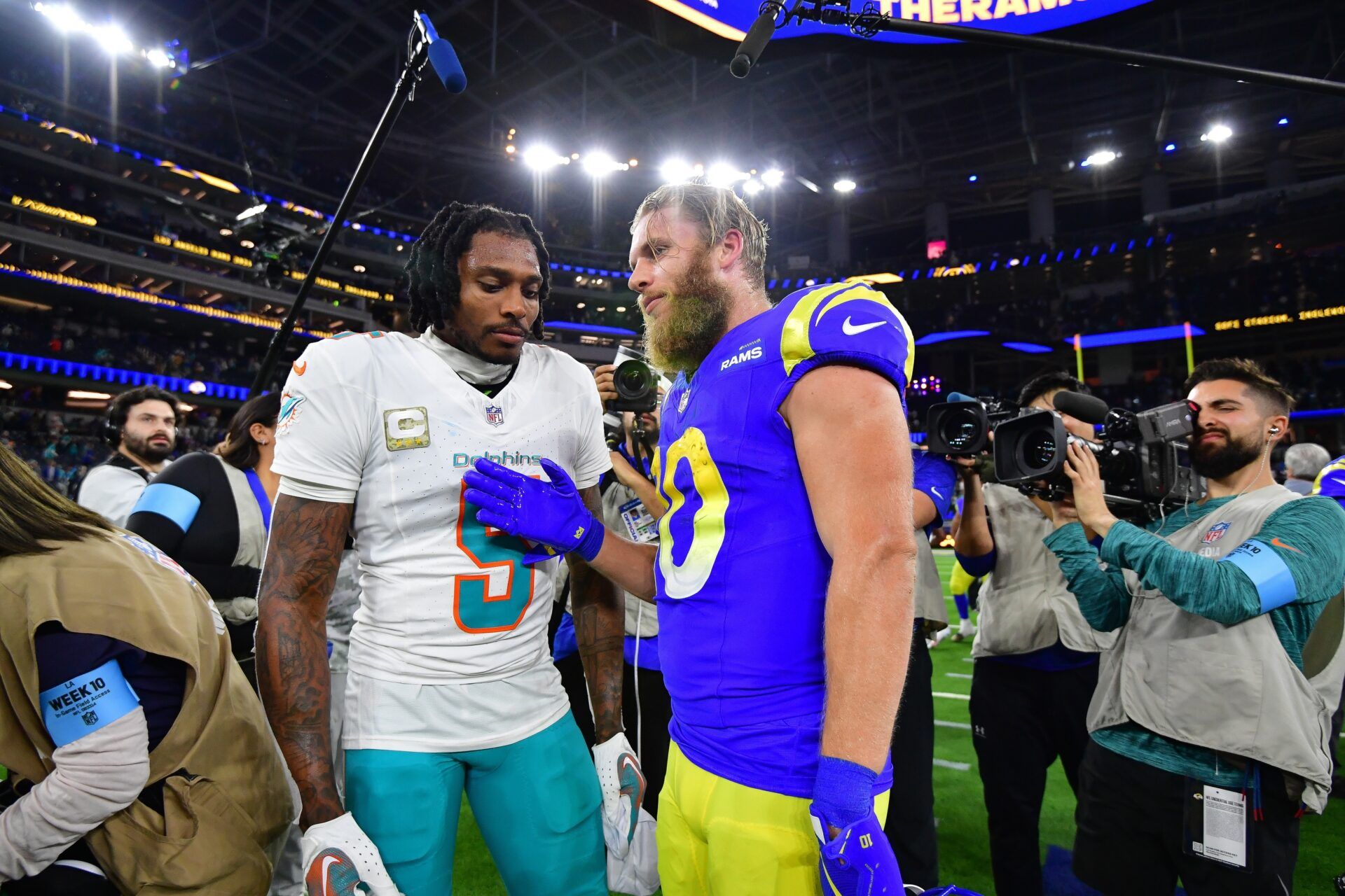 Miami Dolphins cornerback Jalen Ramsey (5) meets with Los Angeles Rams wide receiver Cooper Kupp (10) following the game at SoFi Stadium.