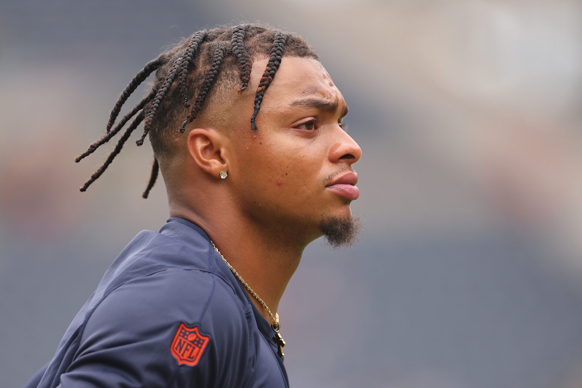 CHICAGO, ILLINOIS - AUGUST 26: Justin Fields #1 of the Chicago Bears warms up prior to a preseason game against the Buffalo Bills at Soldier Field on August 26, 2023 in Chicago, Illinois. (Photo by Michael Reaves/Getty Images)
