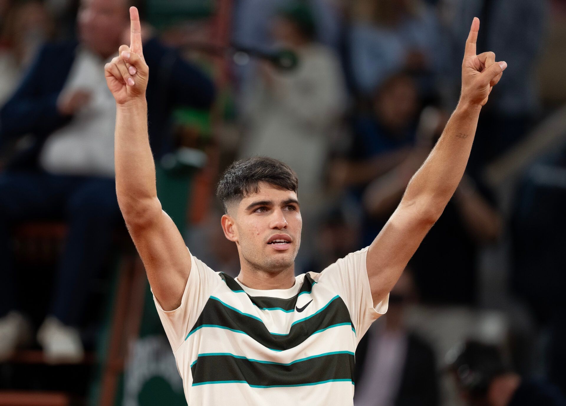 Carlos Alcaraz of Spain celebrates winning his match against Fabian Marozsan of Hungary on day four at Roland Garros Stadium.