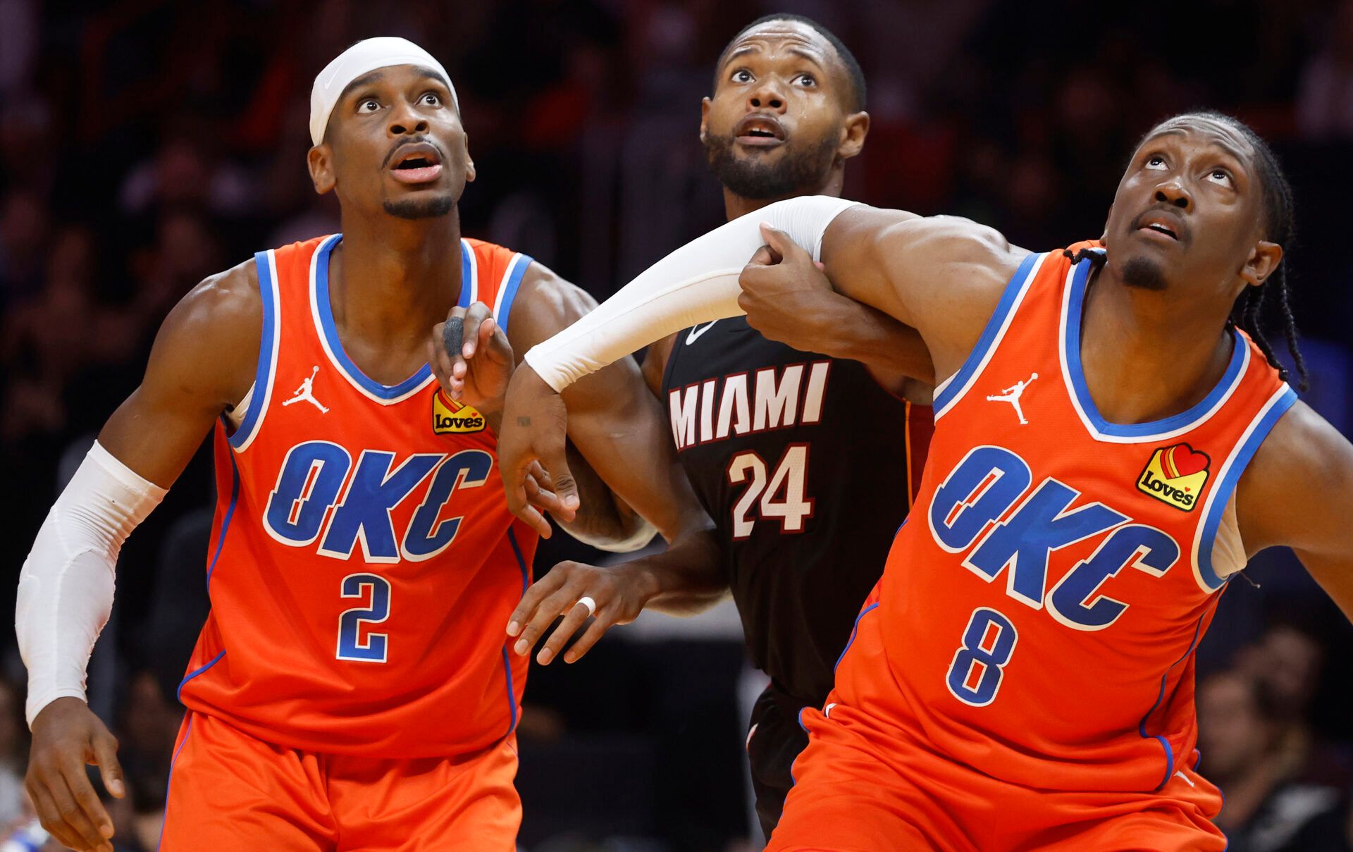 Oklahoma City Thunder guard Shai Gilgeous-Alexander (2), Oklahoma City forward Jalen Williams (8) and Miami Heat forward Haywood Highsmith (24) wait for a rebound during the second half at Kaseya Center.