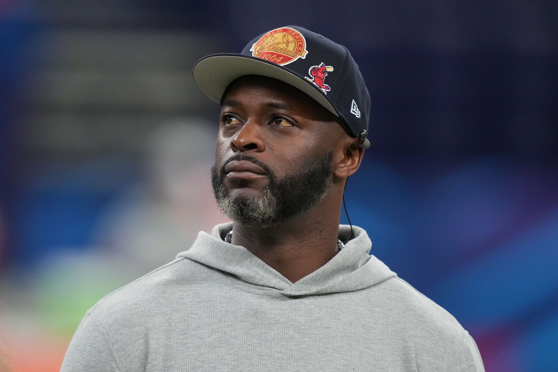 Former NFL player Reggie Wayne looks on during the 2025 NFL Combine at Lucas Oil Stadium.